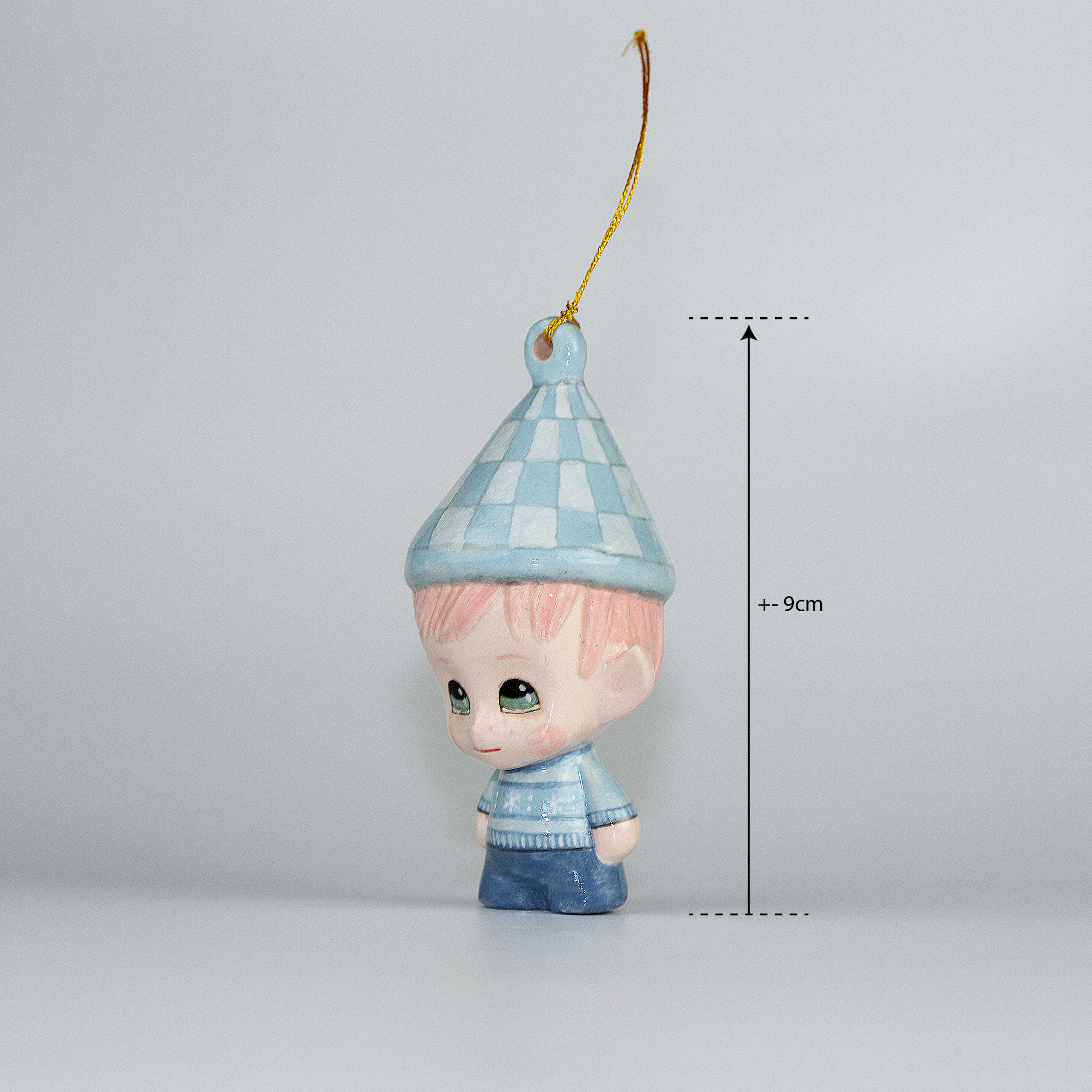 Handmade Porcelain Christmas ornament. One-of-a-kind. Sally, the Christmas Sweater designer Elf.