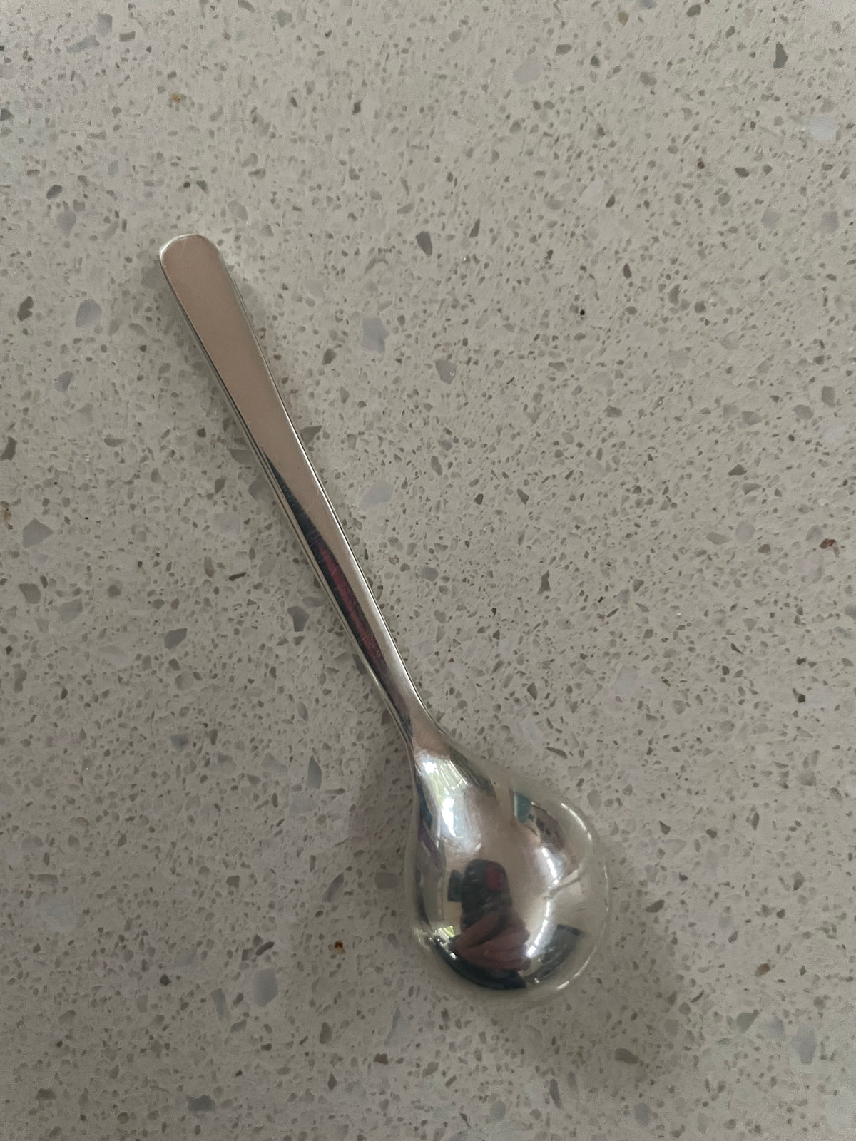 Sterling silver salt spoon with 12 lab sapphires