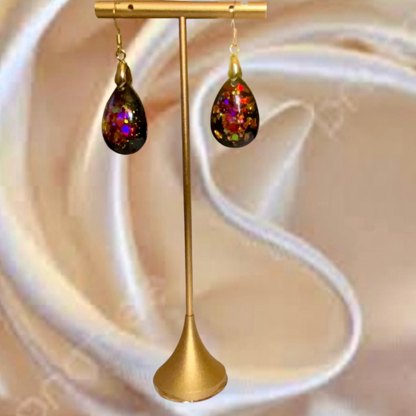 Red, Gold, On Black Teardrop