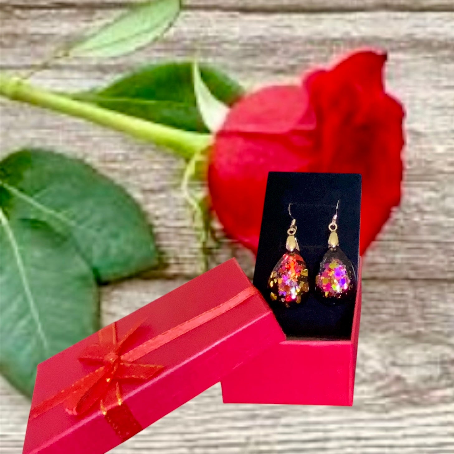 Red, Gold, On Black Teardrop