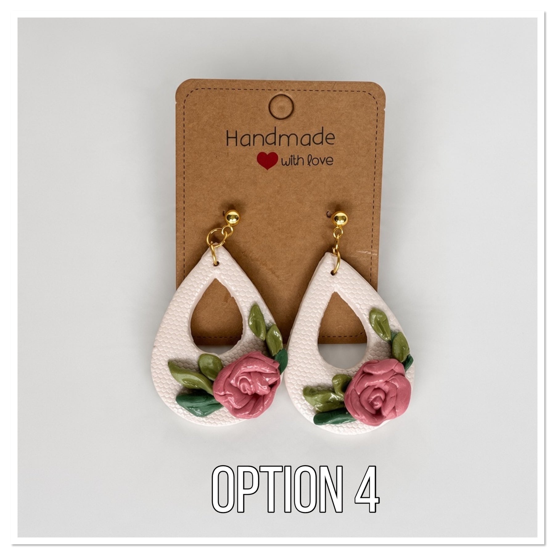 Earthy botanical ivory earrings feature hand-sculpted Flowers