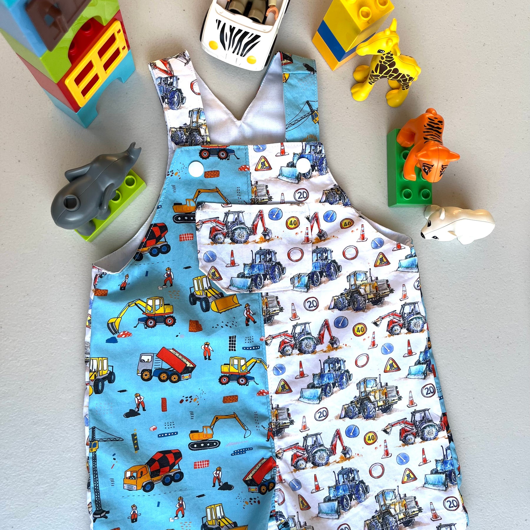 baby overalls/shorts | construction trucks