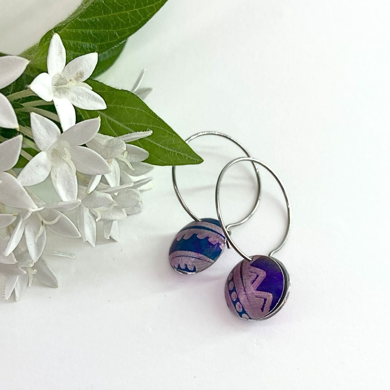 Anodised aluminium earrings hand printed Aztec Aura Collection