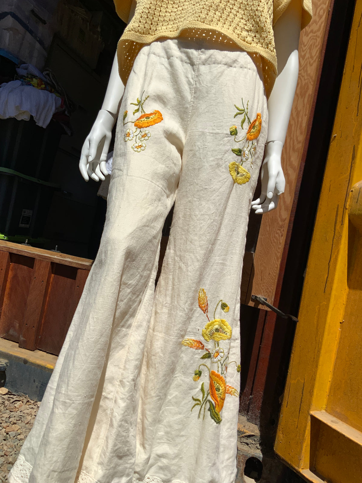 Upcycled embroidered linen tablecloth into "Flower Power" Bell Bottoms