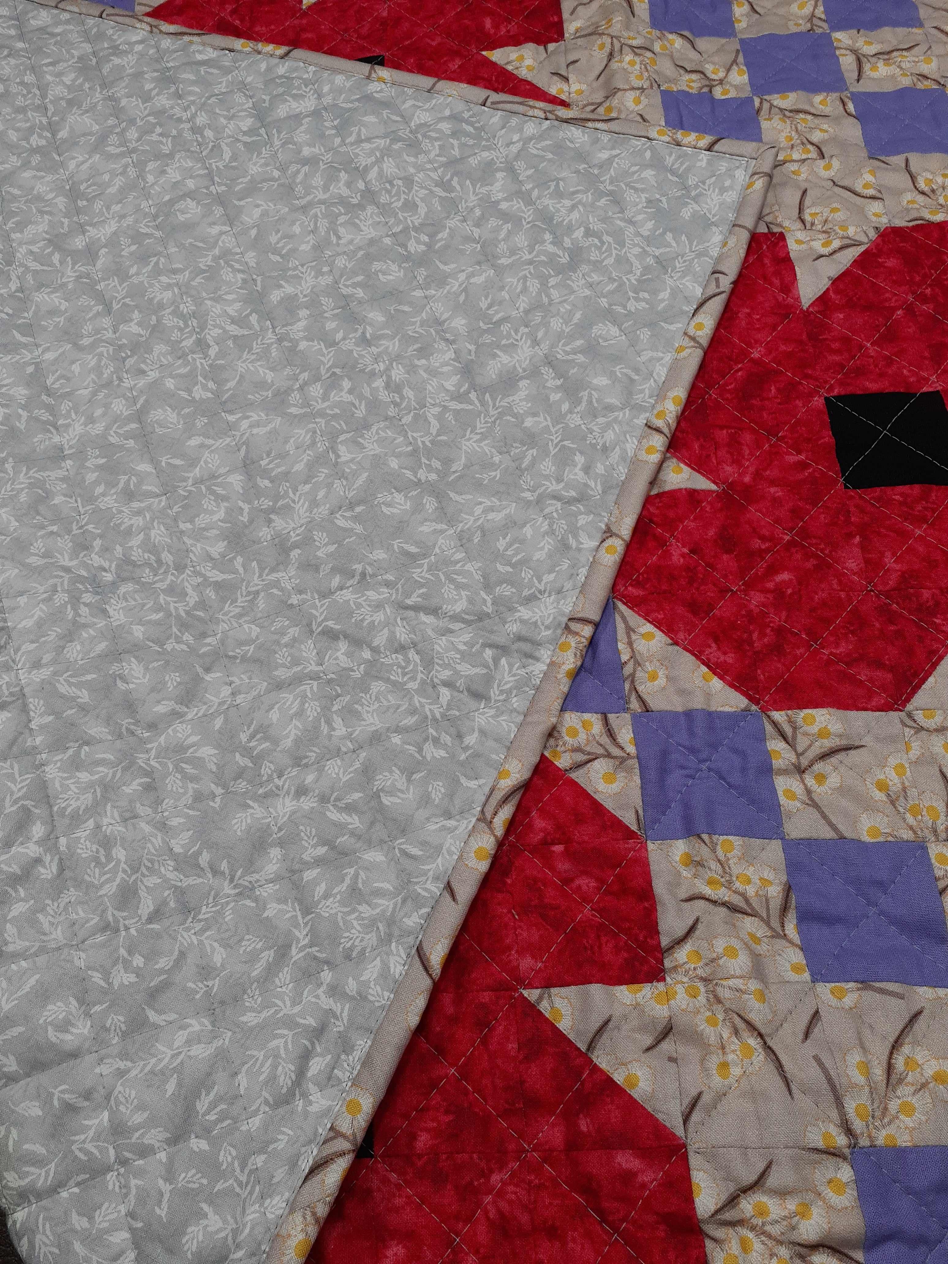 Red poppies Irish chain patchwork quilt