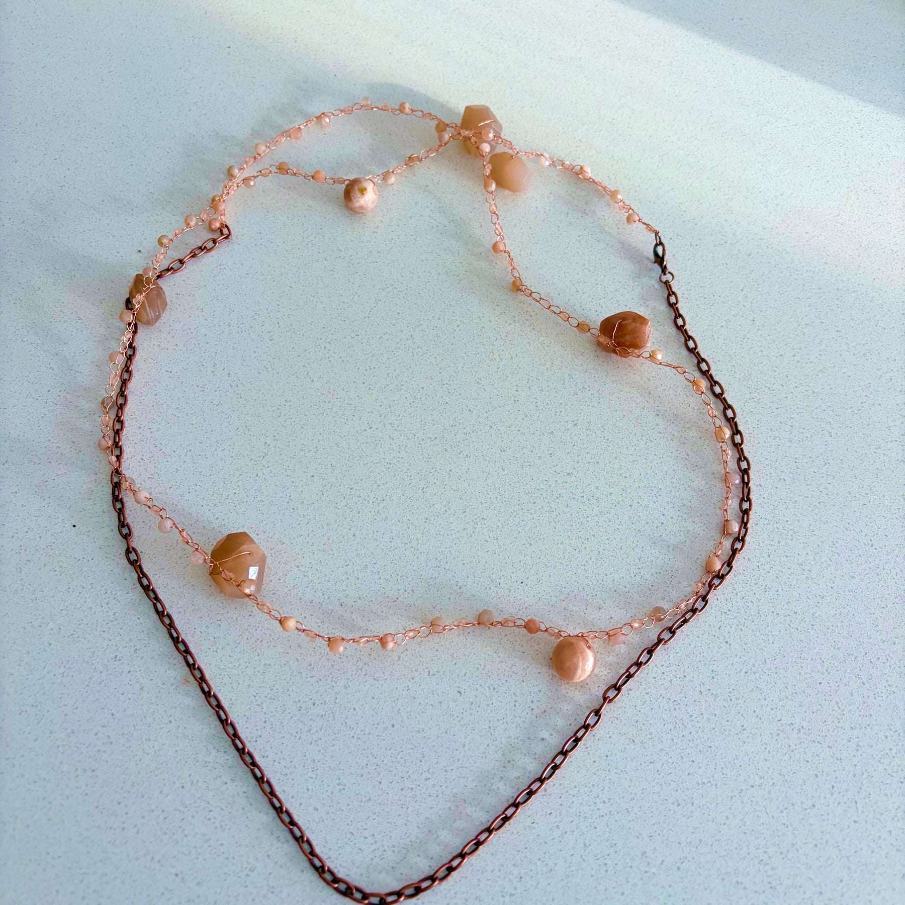 Moon Twist-peach moonstone and copper crochet necklace
