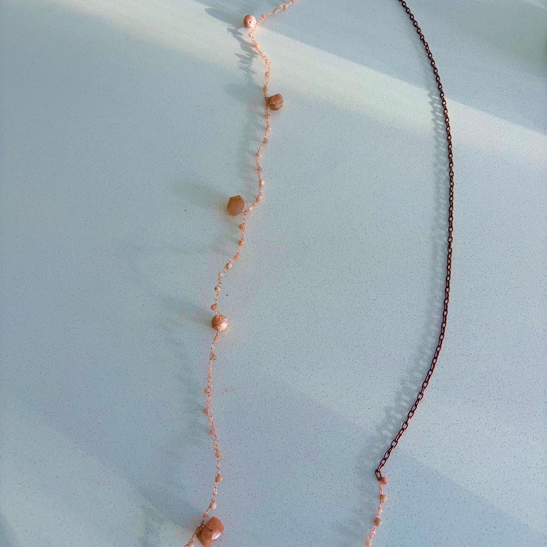 Moon Twist-peach moonstone and copper crochet necklace