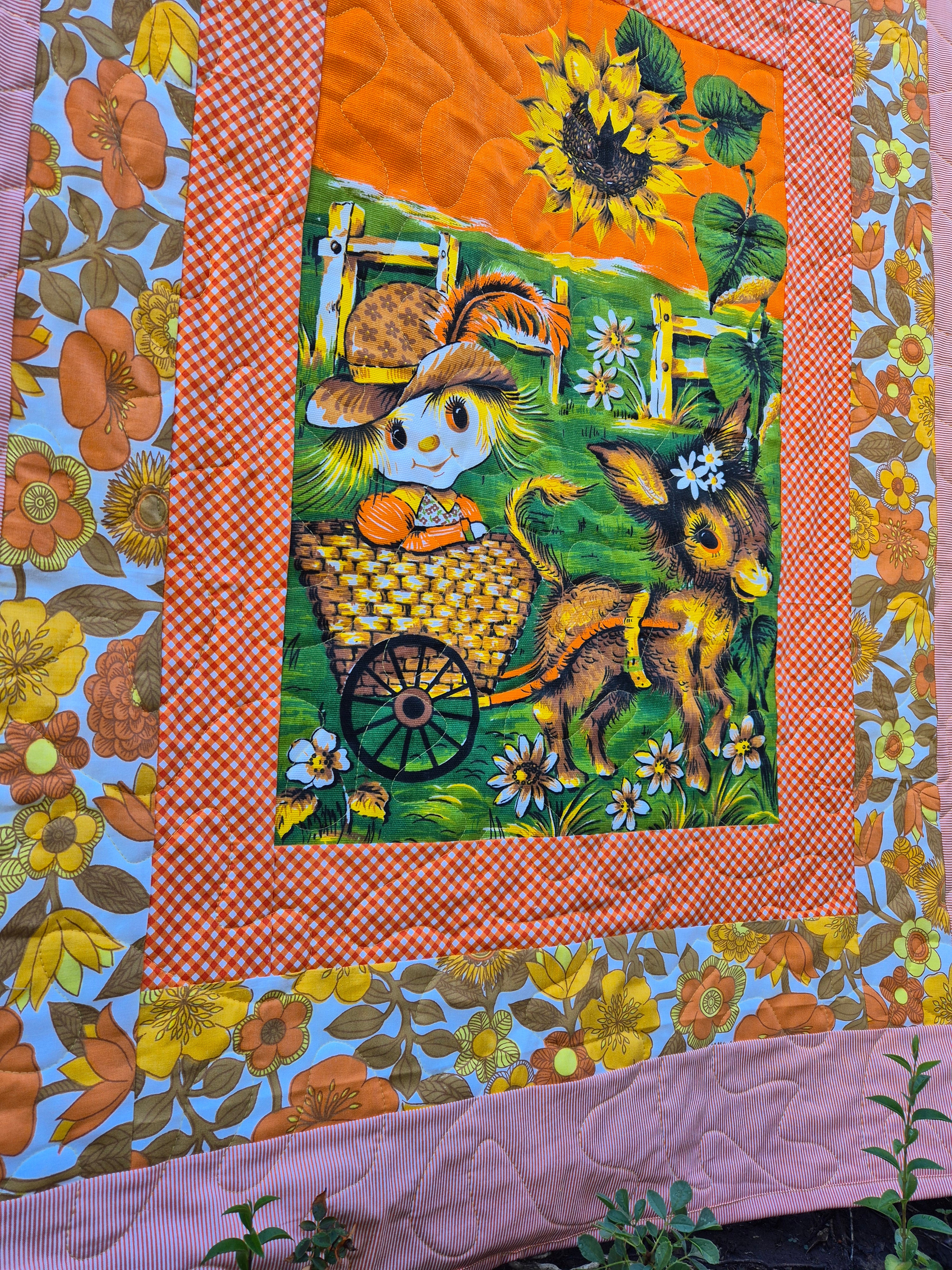 Sunflowers and daisies, girl cot sized quilt