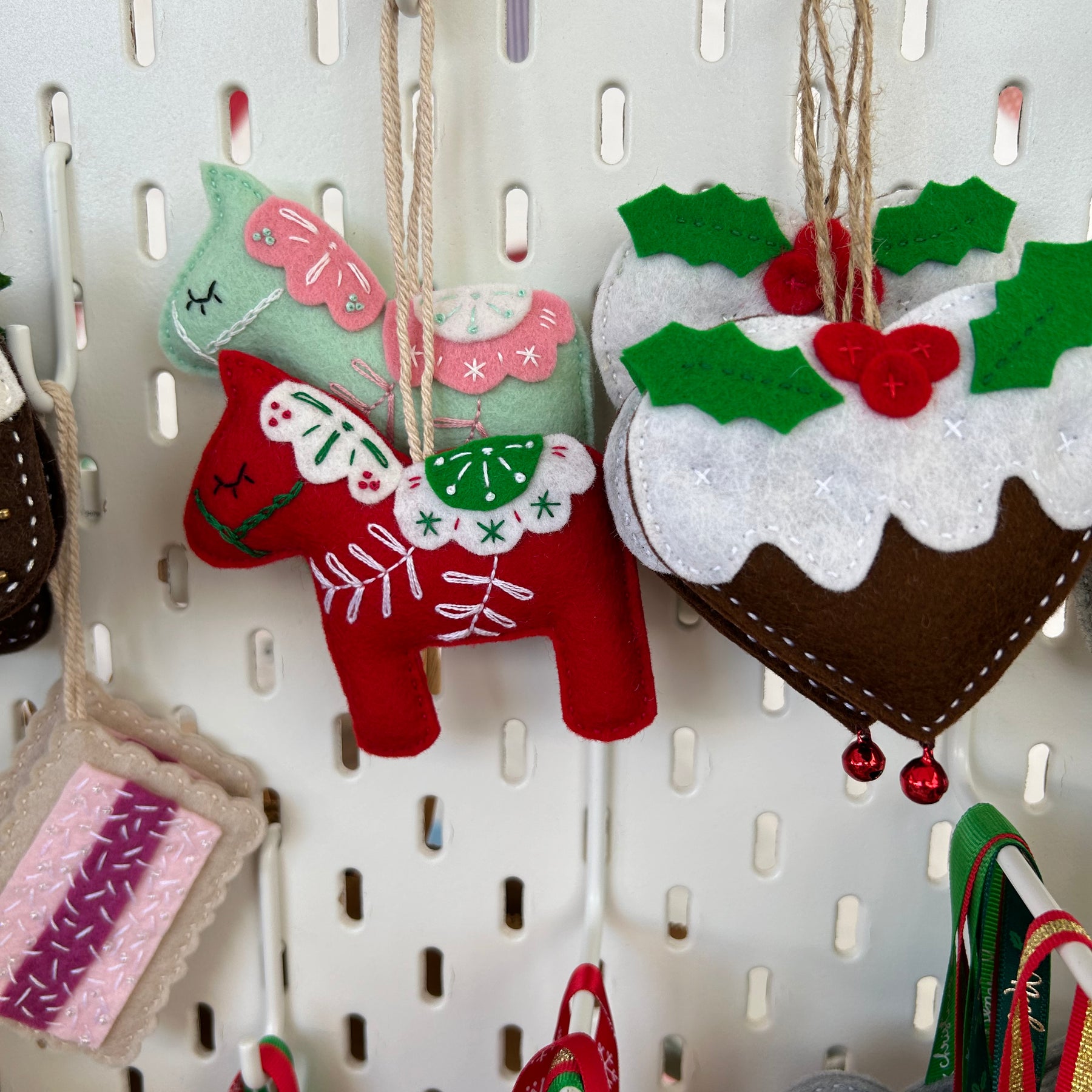 Scandinavian-inspired Dala horse ornament, hand embroidered for timeless holiday charm