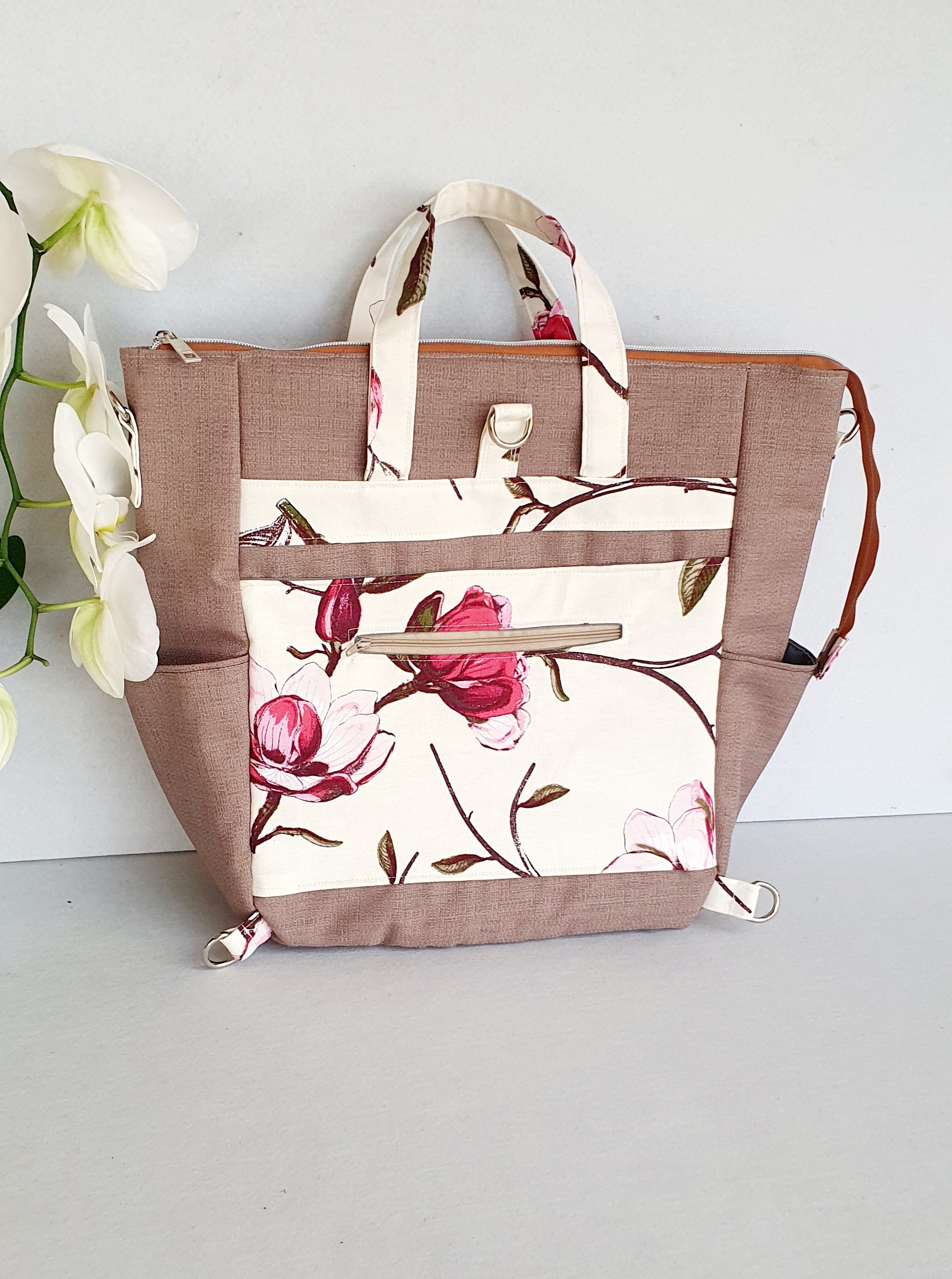 Magnolia Blossom modern bag converting from handbag into crossbody or backpack