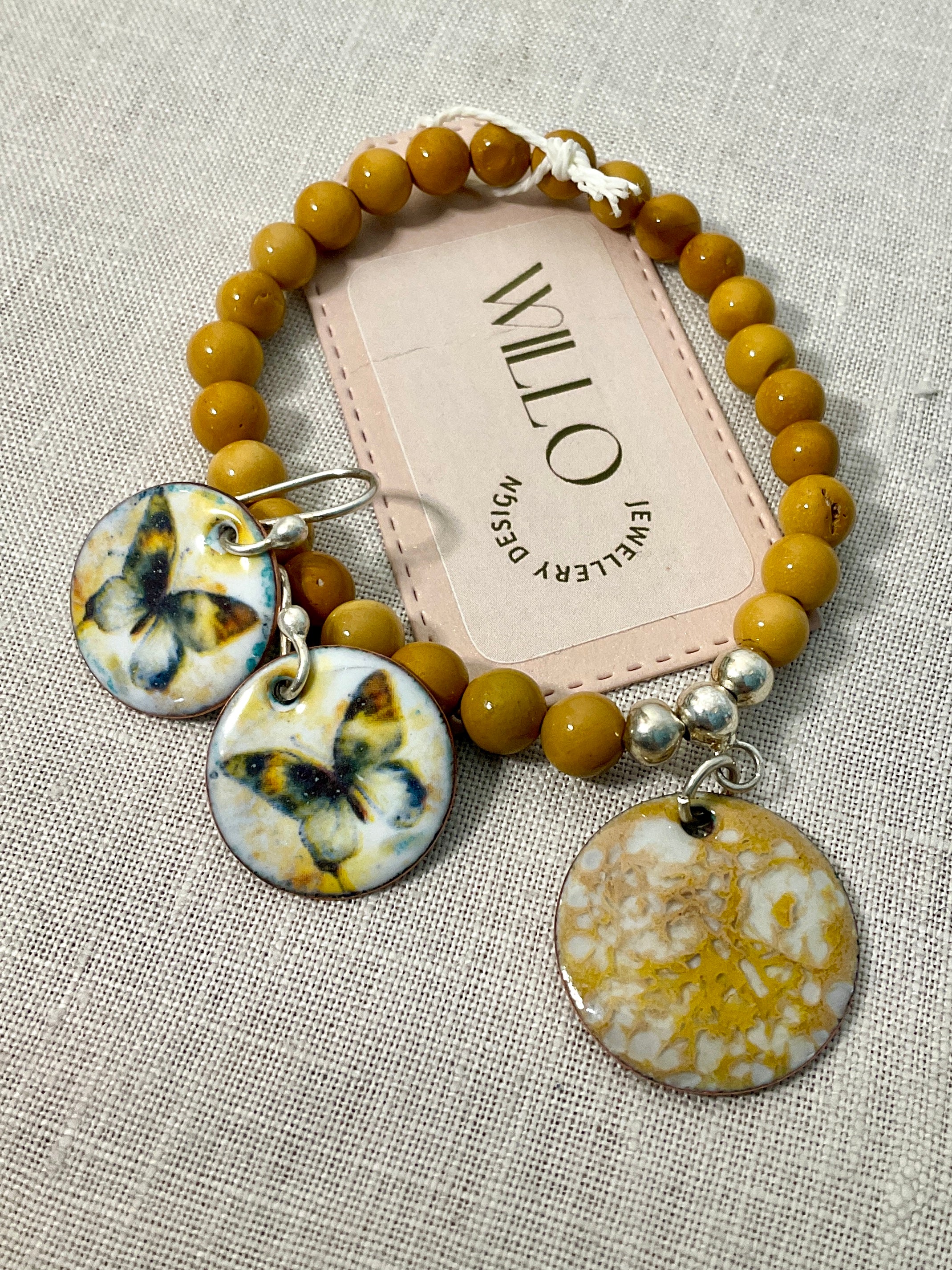 Wood Jasper gemstone bracelet with enamel charm.