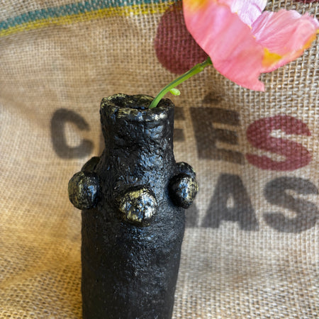 Small black and gold vase