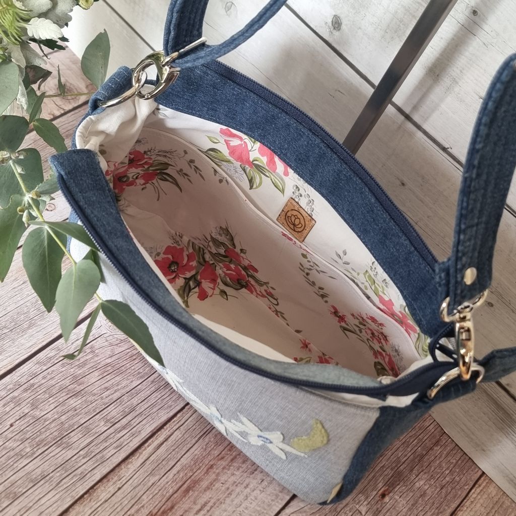 Handmade appliqued crossbody zip bag - blue with flannel flowers