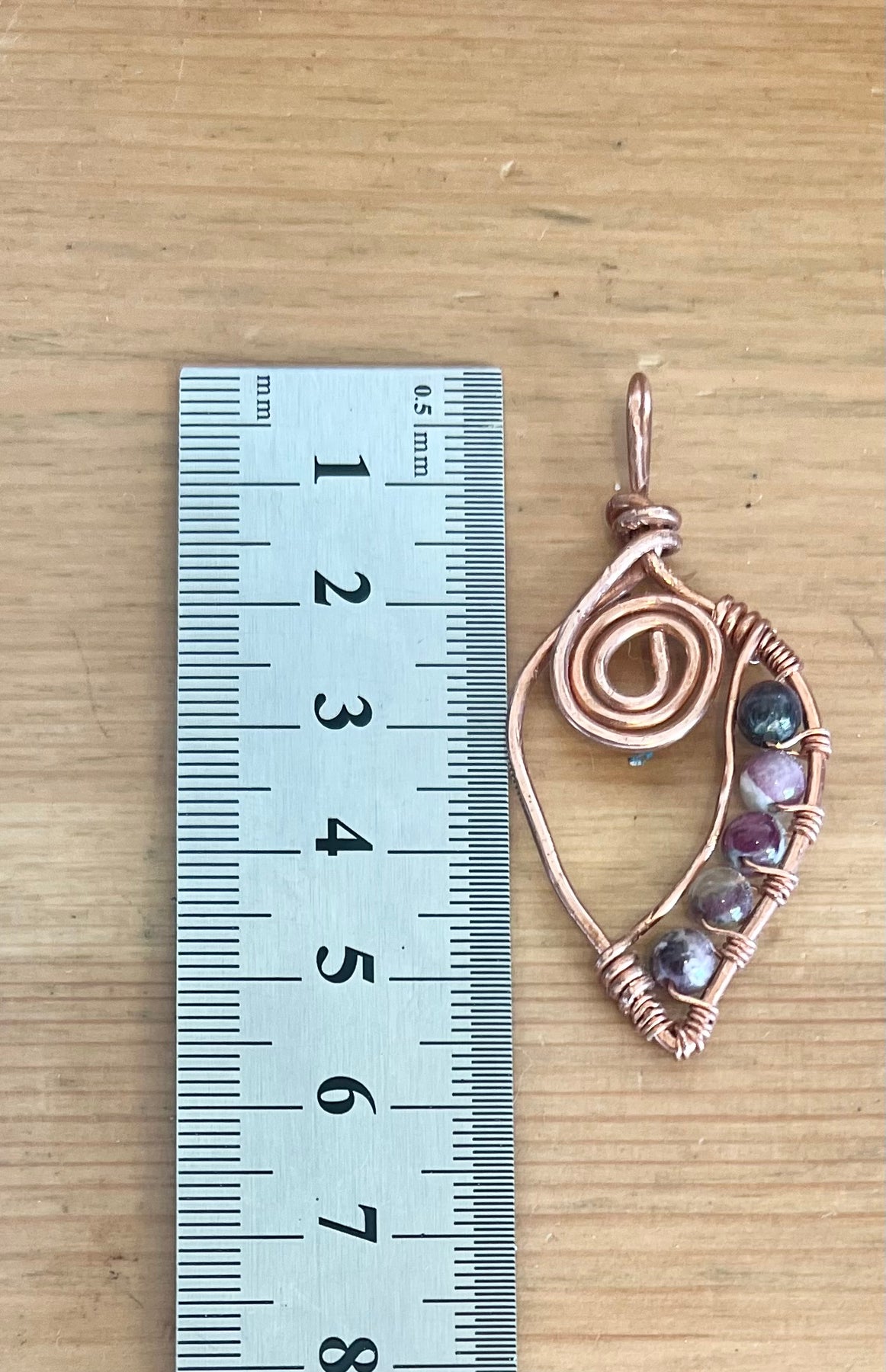 Unique Copper Spiral Gemstone Pendant with brown cord
