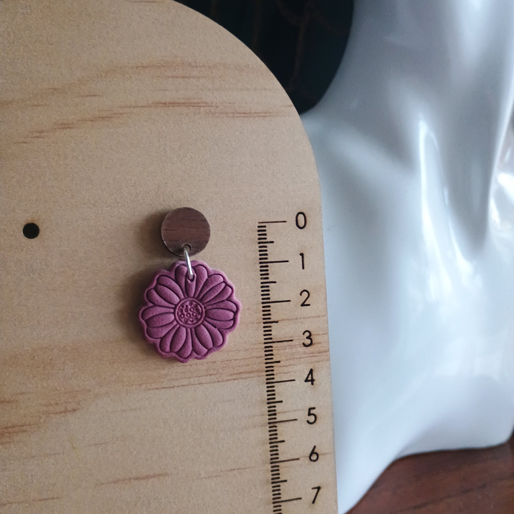 Earthy embossed flower earrings with natural wood stud