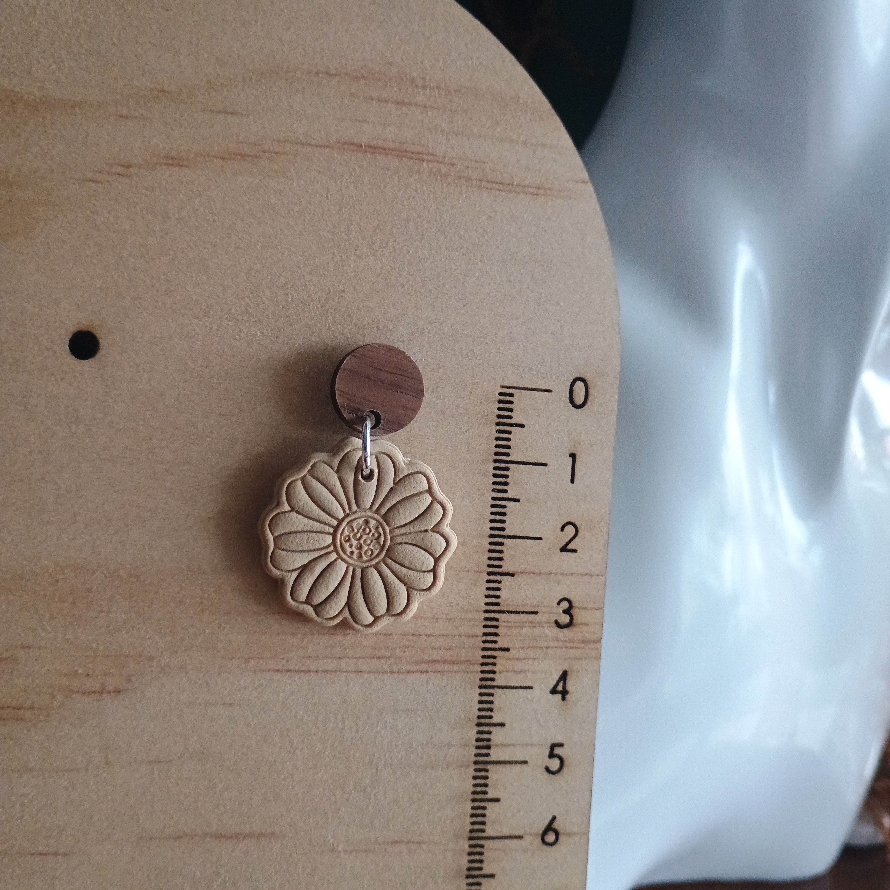 Earthy embossed flower earrings with natural wood stud