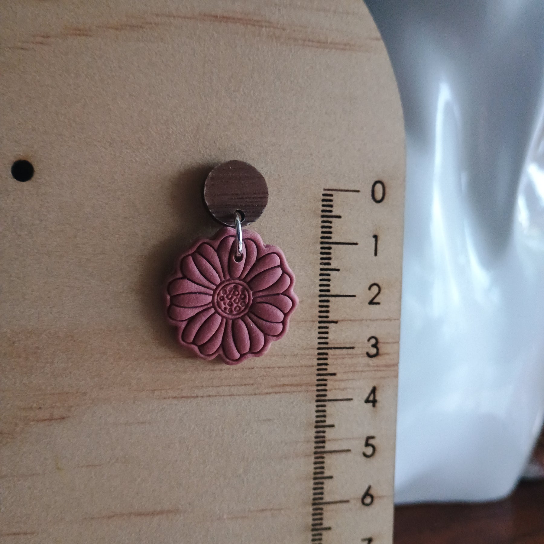 Earthy embossed flower earrings with natural wood stud