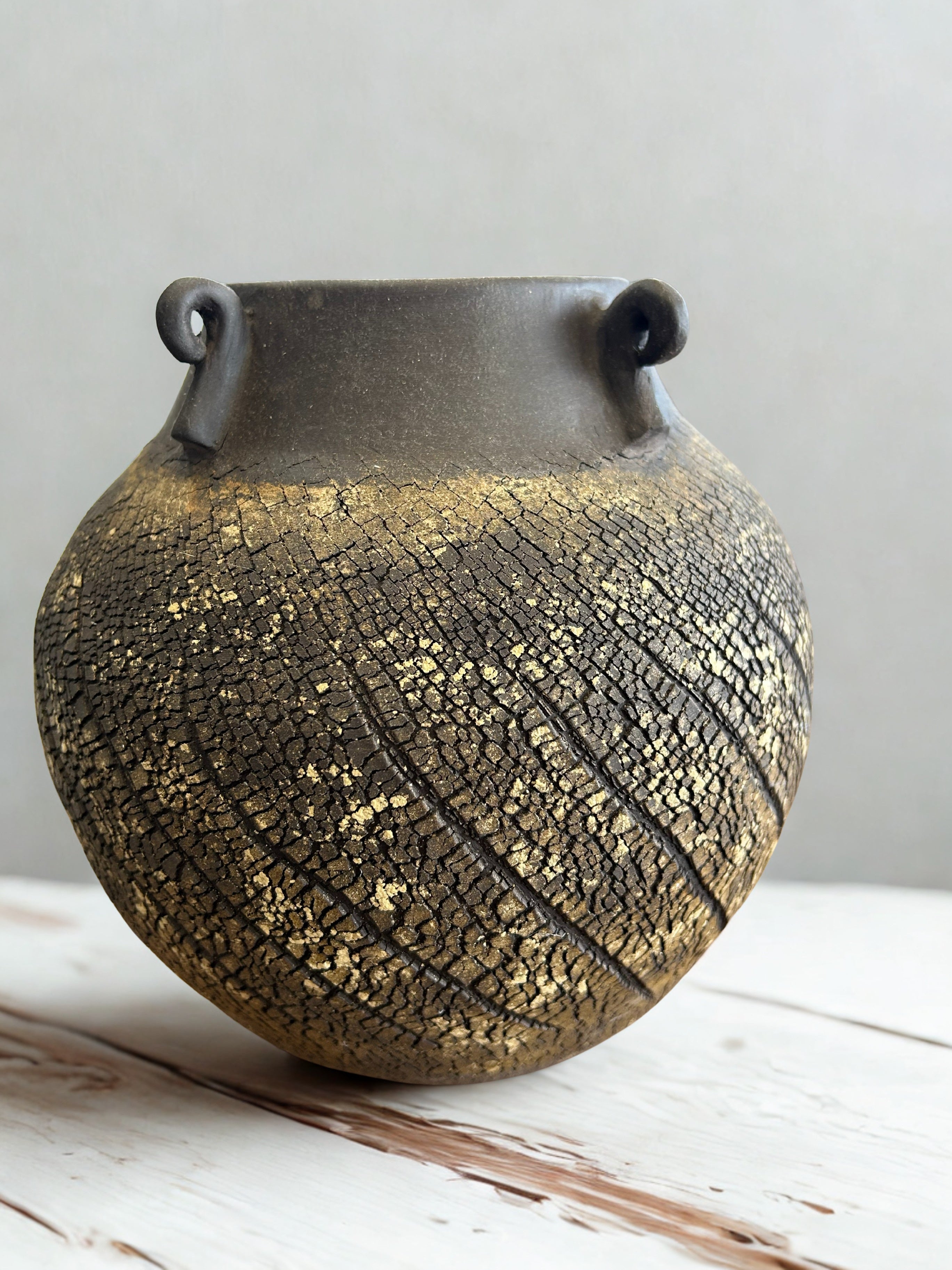 Black yellow urn