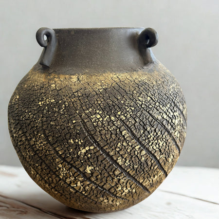 Black yellow urn