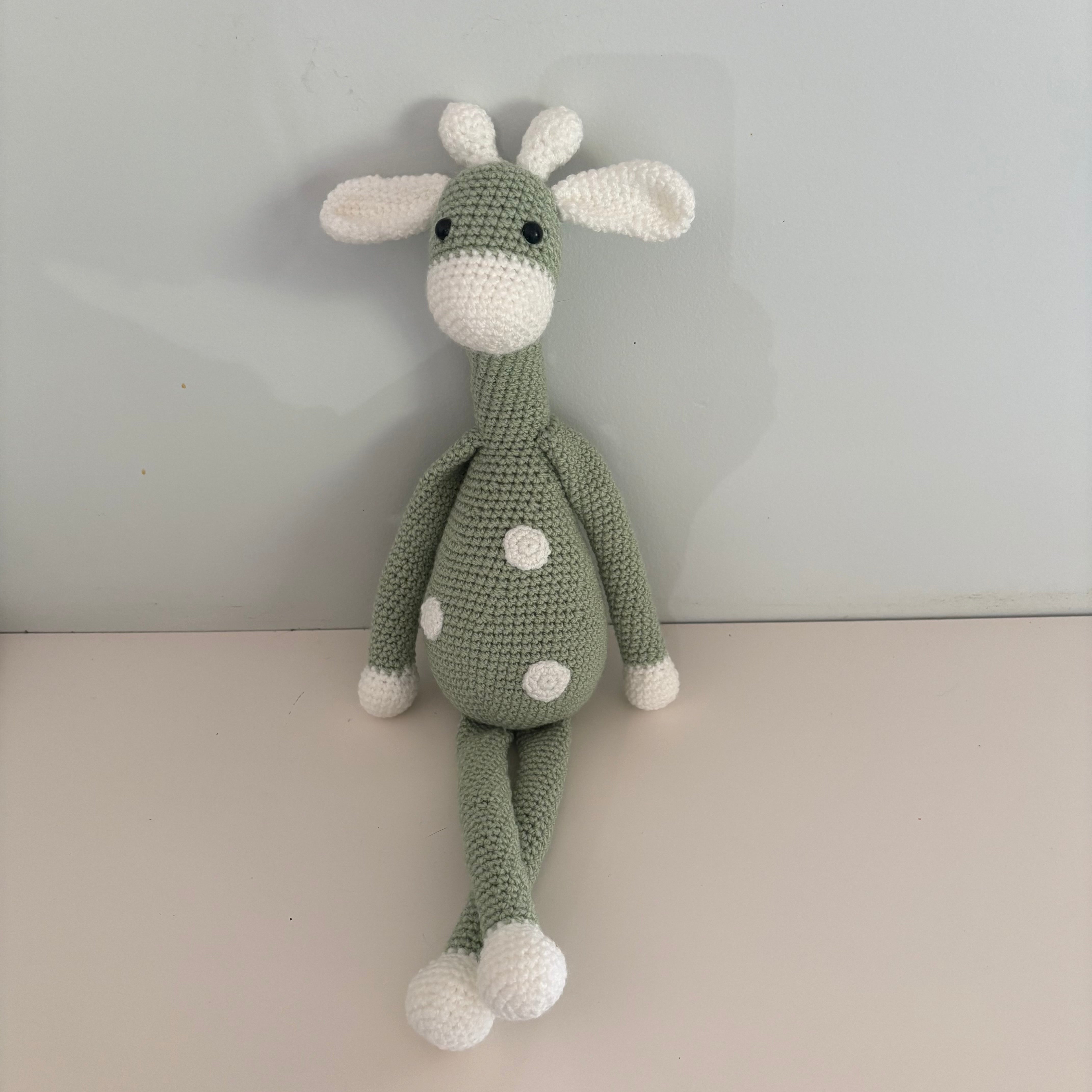 Long legged goofy giraffe crochet soft toy
