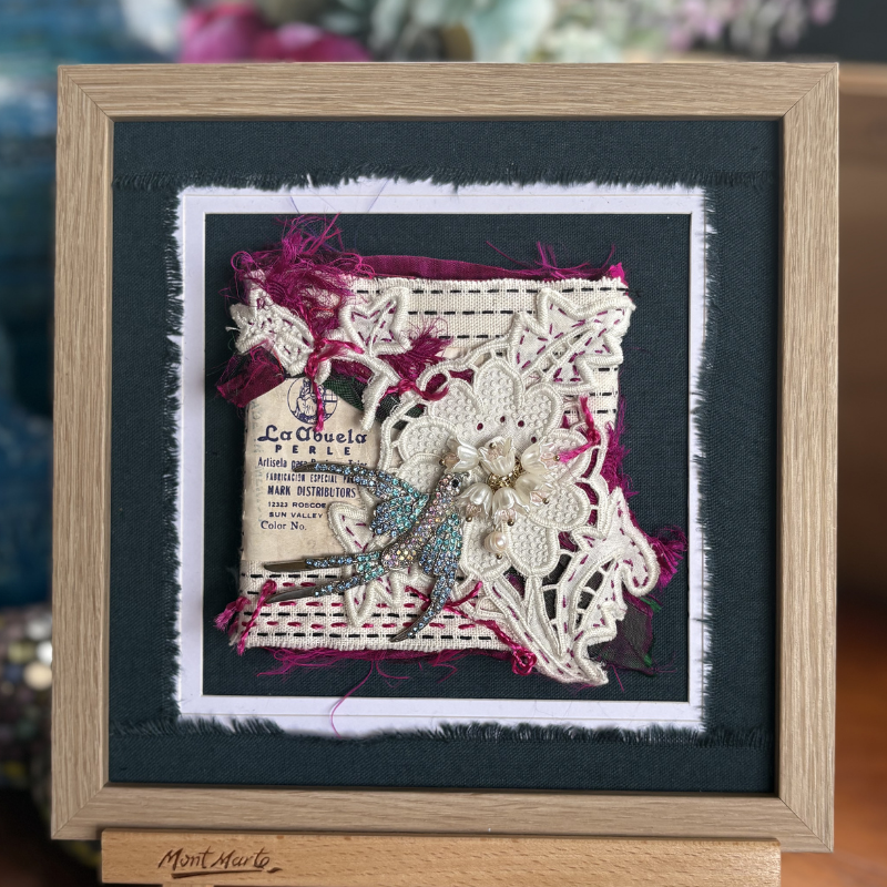 Jewelled bird and flowers, framed mixed media