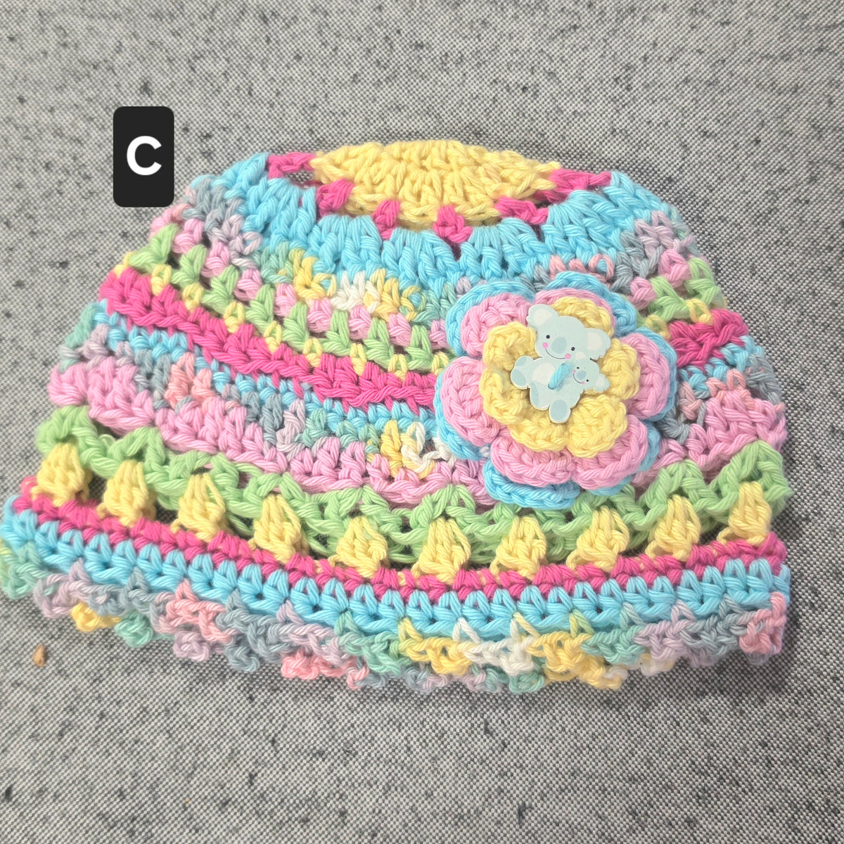 Crocheted Baby Hat with Flower Detail