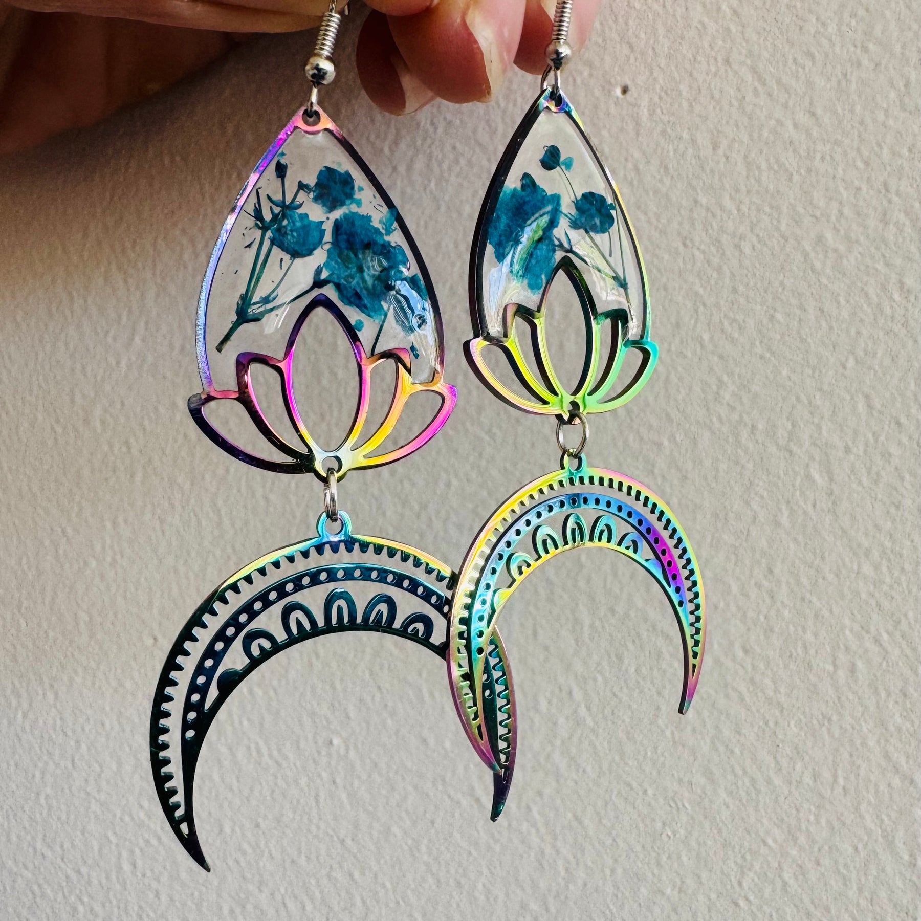 Iridescent rainbow resin earrings with pressed flowers