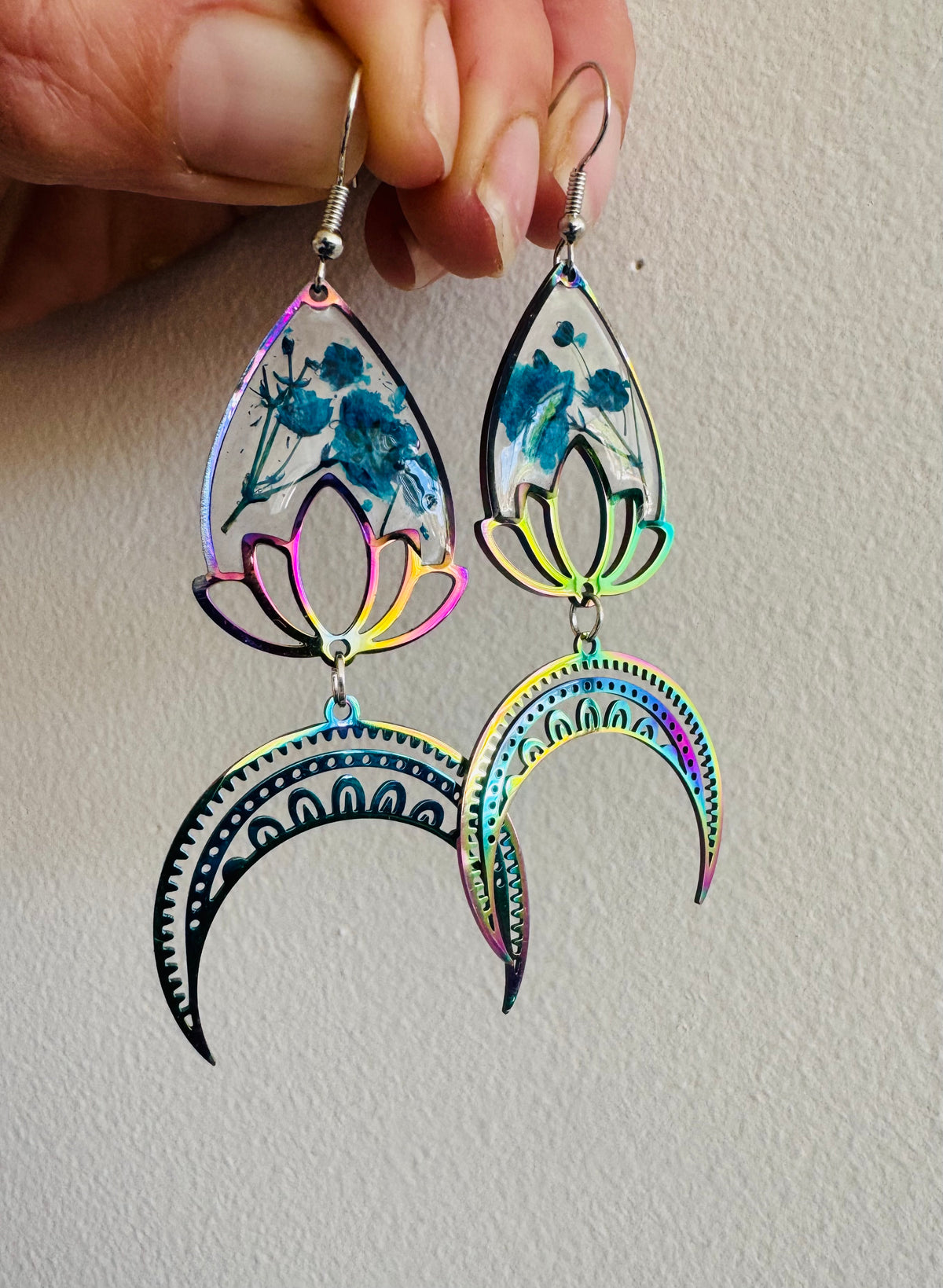 Iridescent rainbow resin earrings with pressed flowers