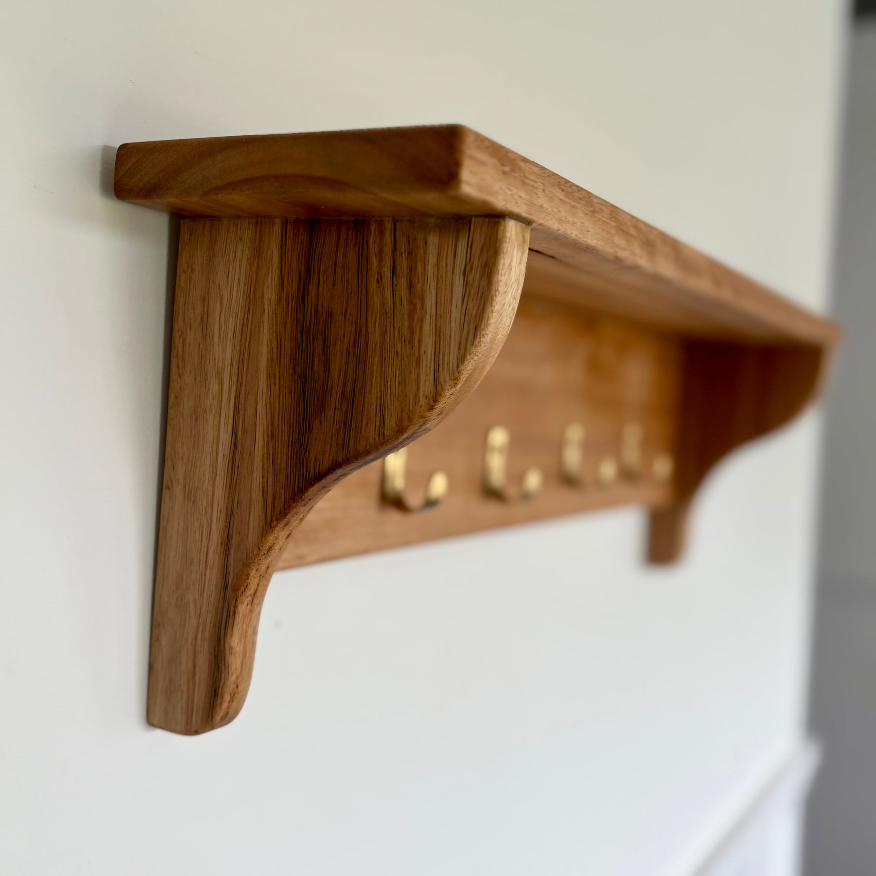 Blackbutt wall shelf with gold hooks