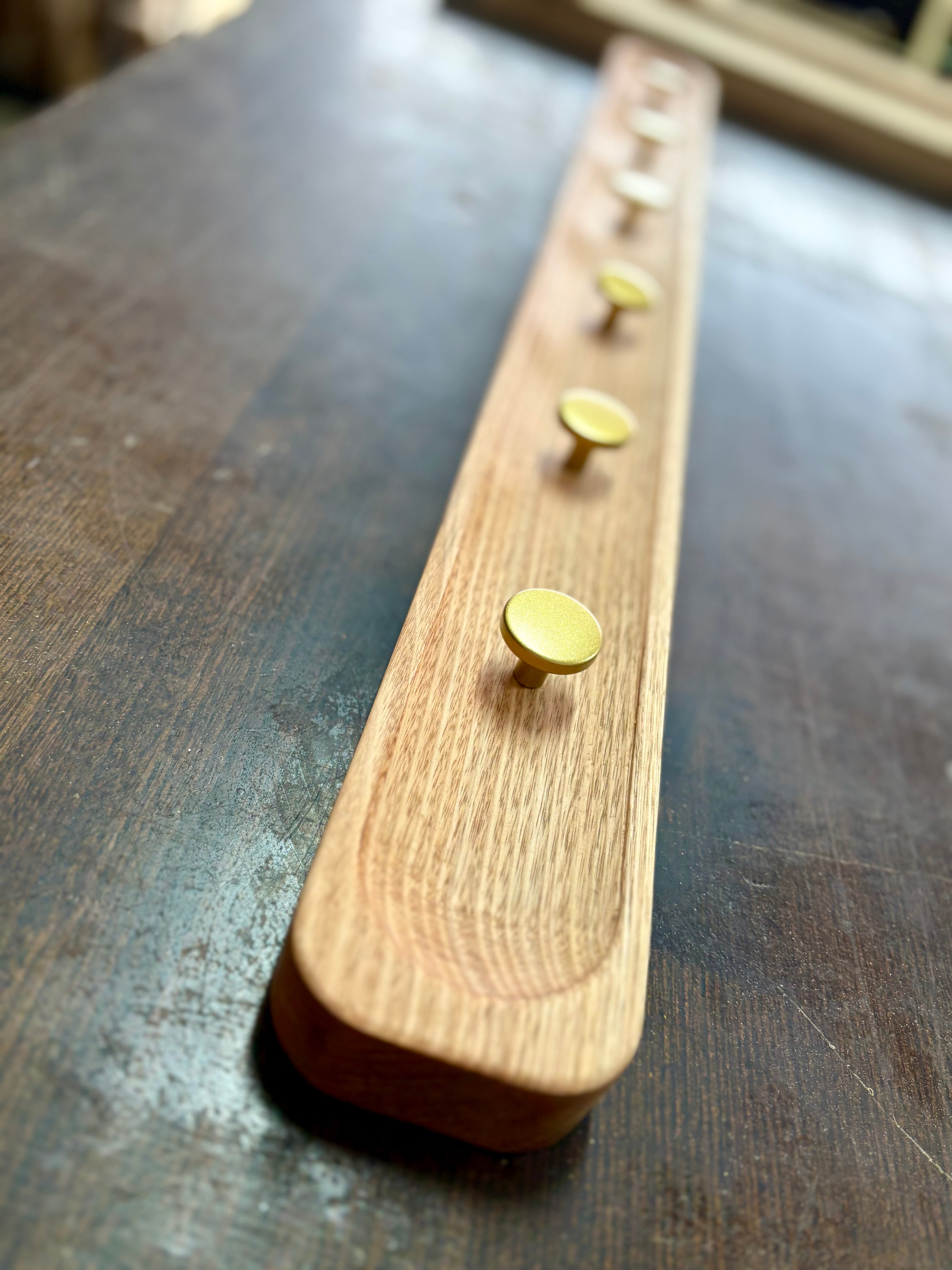 No.1 Tasmanian oak coat rack with gold hooks