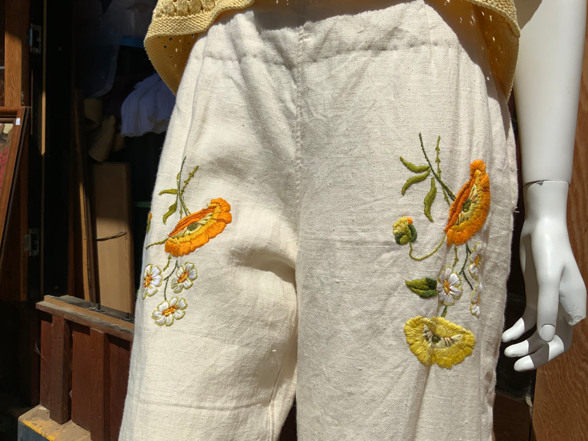 Upcycled embroidered linen tablecloth into "Flower Power" Bell Bottoms