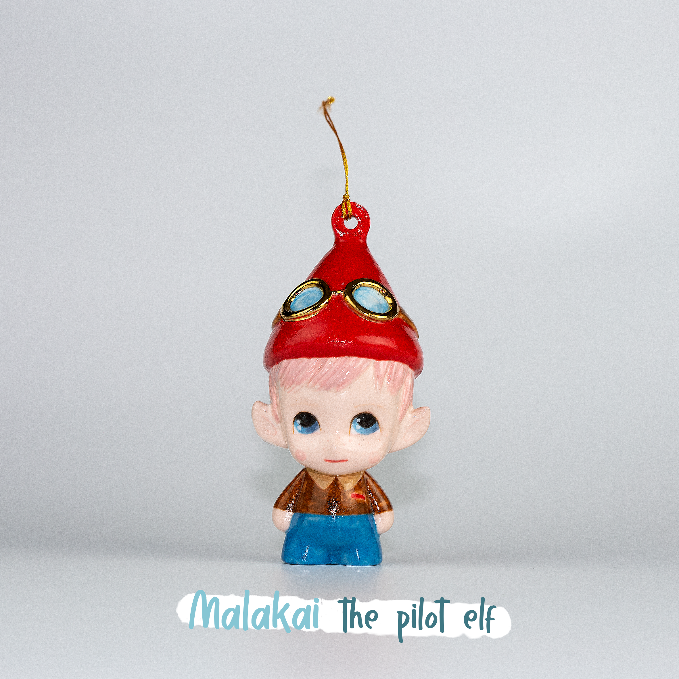 Malakai the Pilot Elf. One-of-a-kind Handmade Porcelain Christmas ELF figurine ornament.