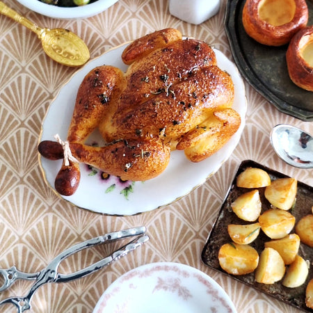 Roast Turkey (with ornate serving tongs)