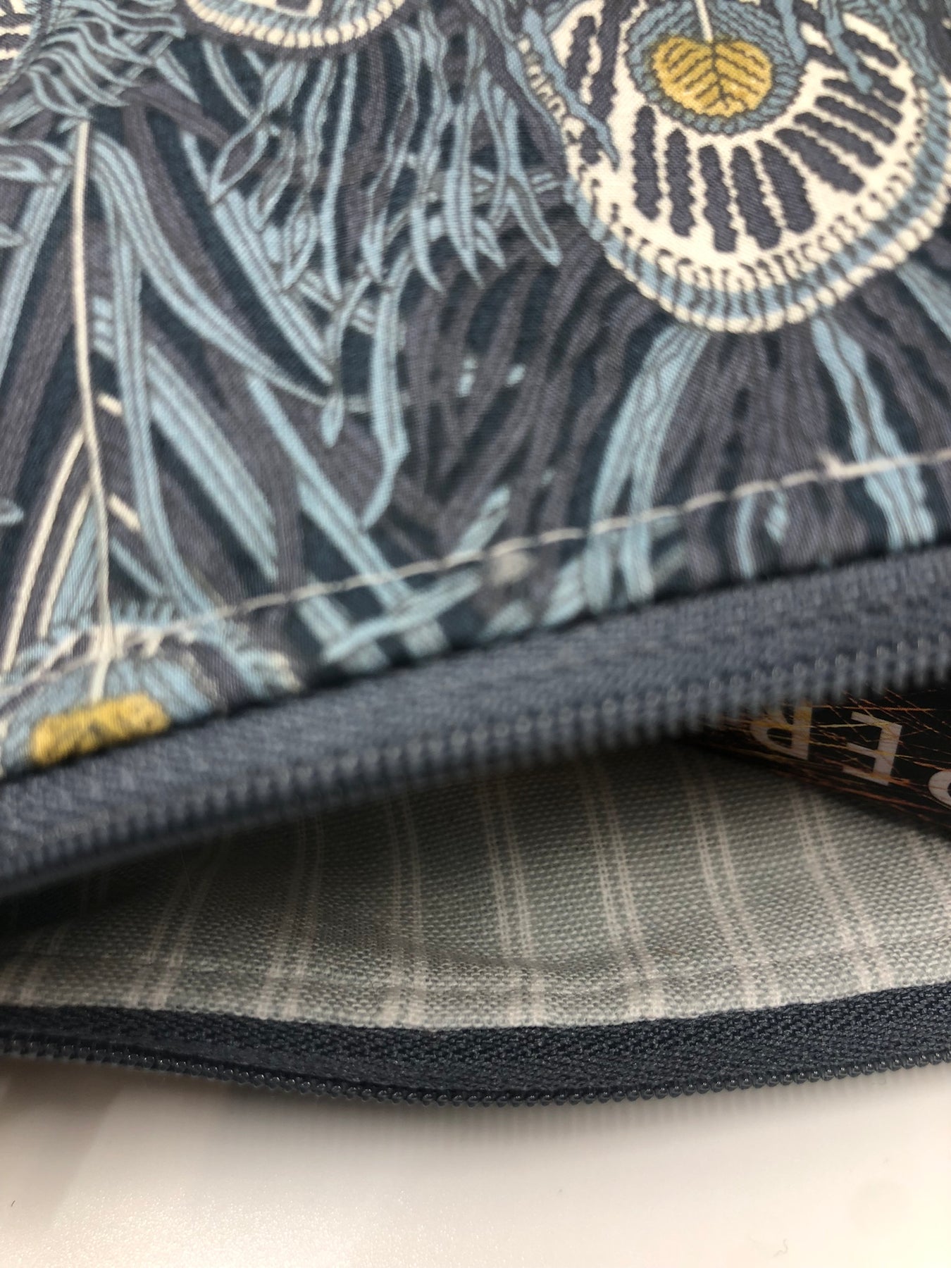 Liberty fabric Hera design - fully lined with grey stripe ticking.  Inner zipper pocket