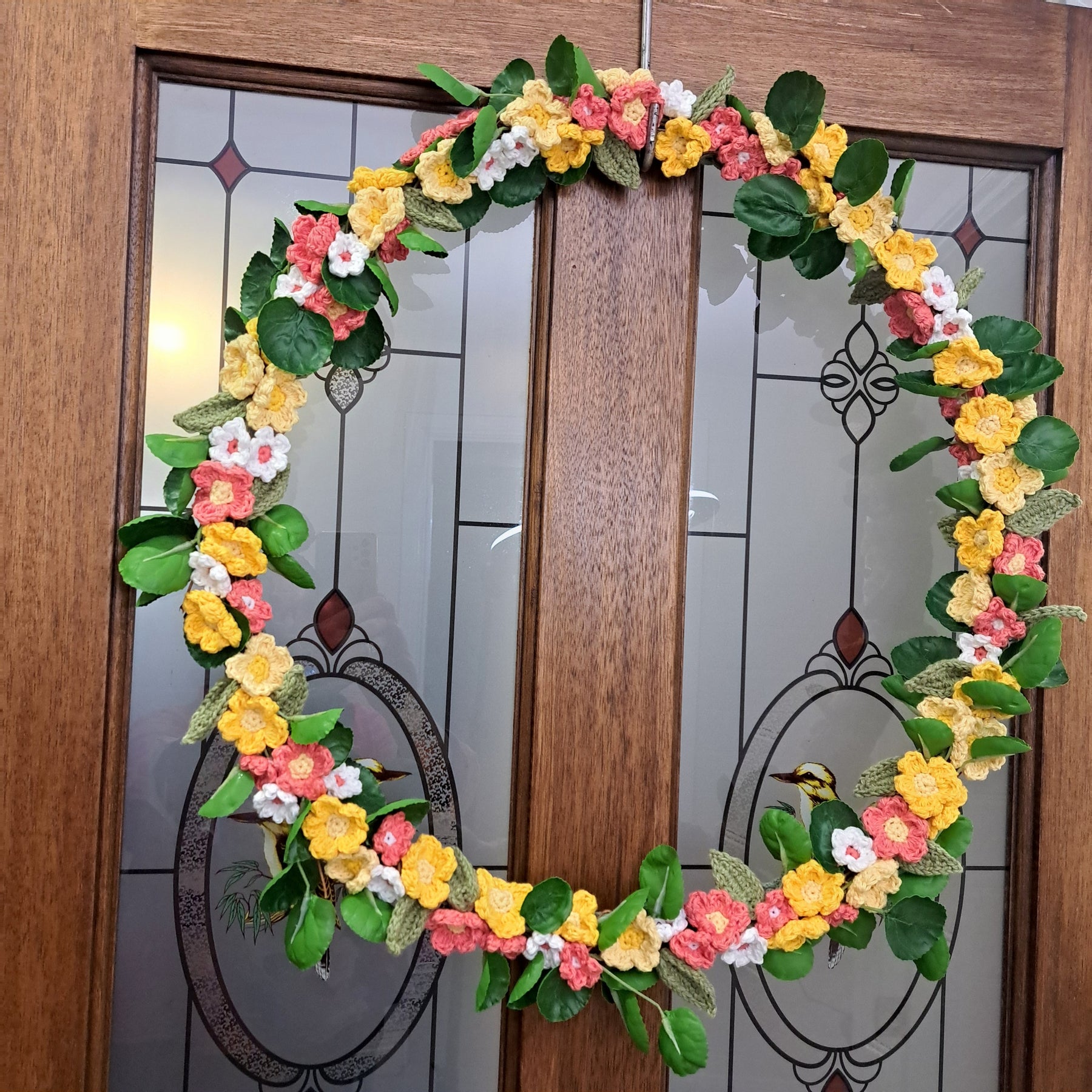 Handmade crochet spring flower wreath, yellows, pinks, white