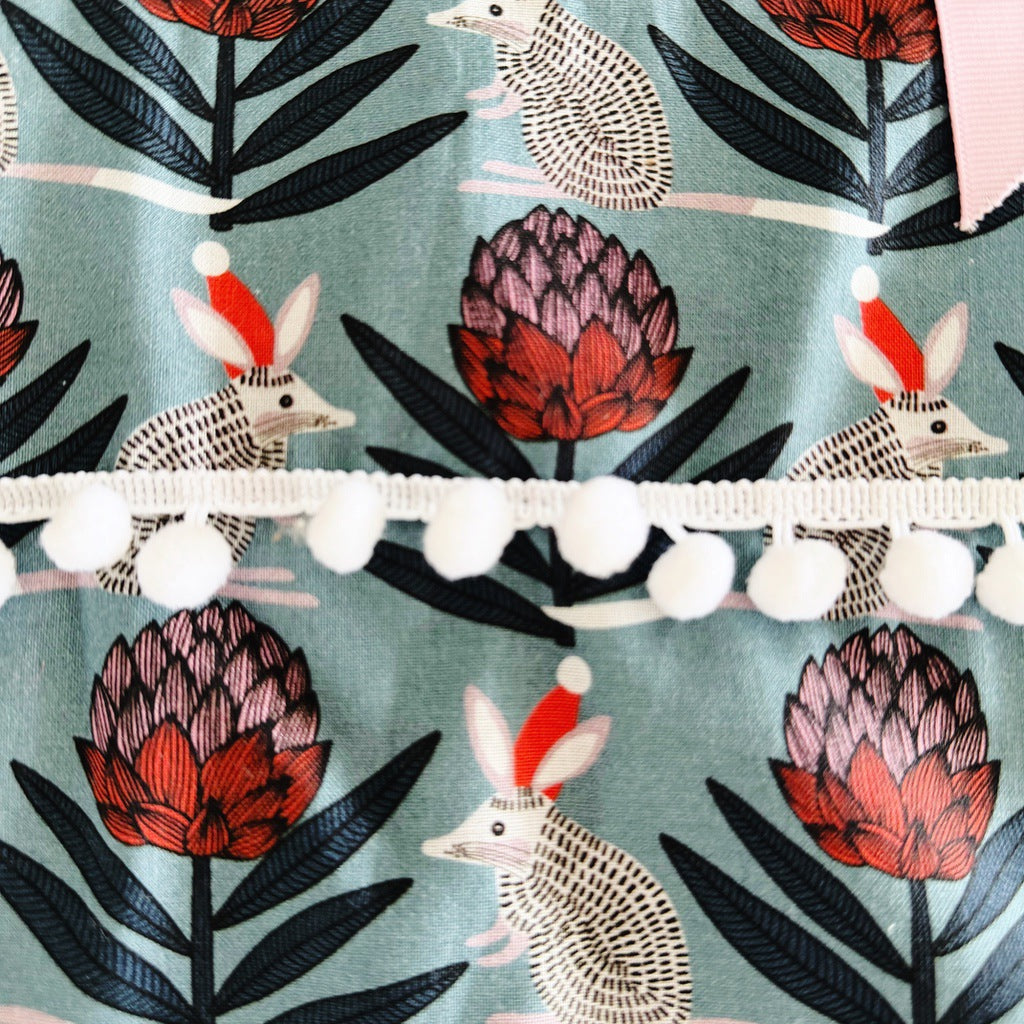 Bilby and waratahs Christmas ladies' tie back apron.