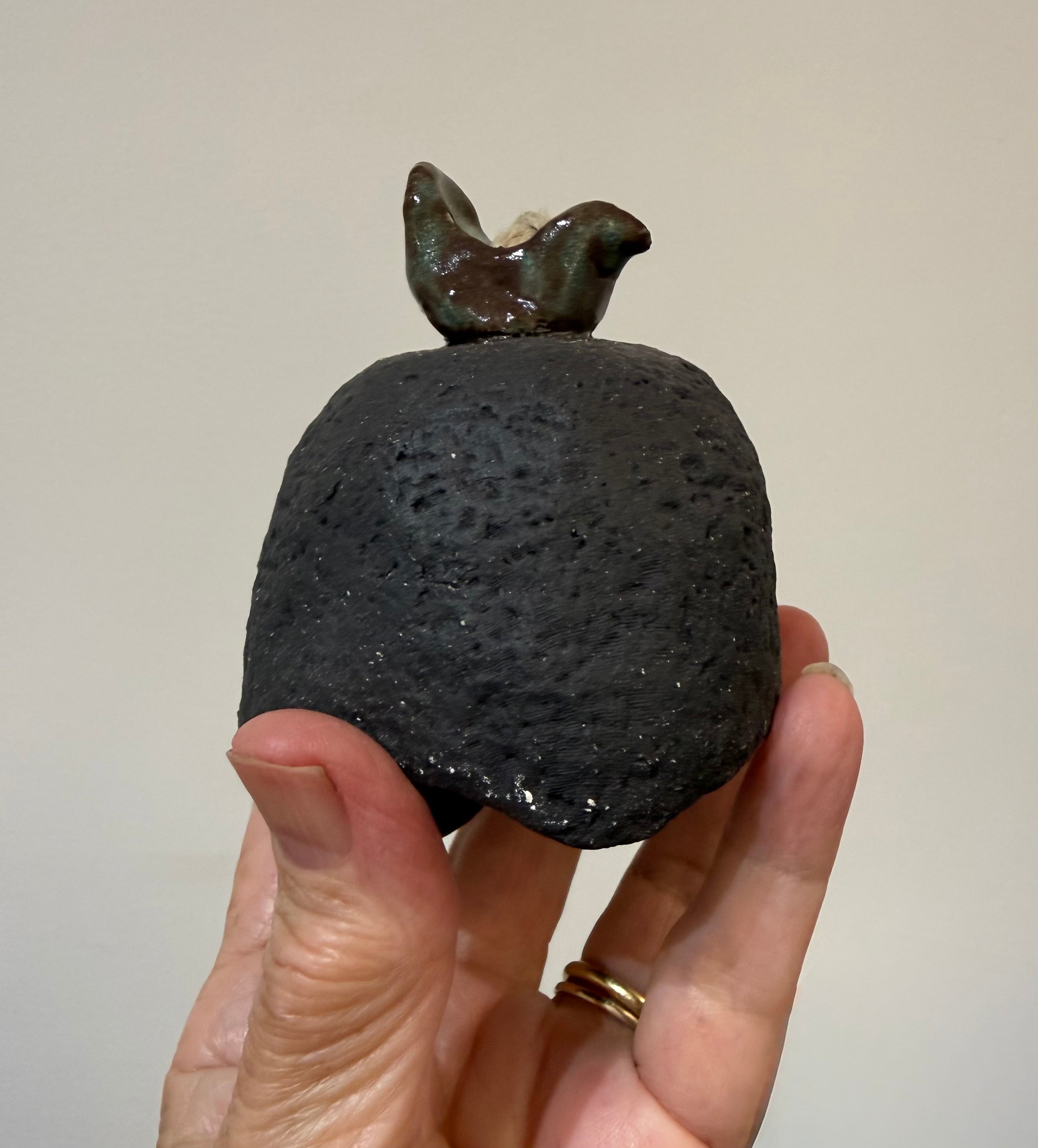 Rustic bell with bird