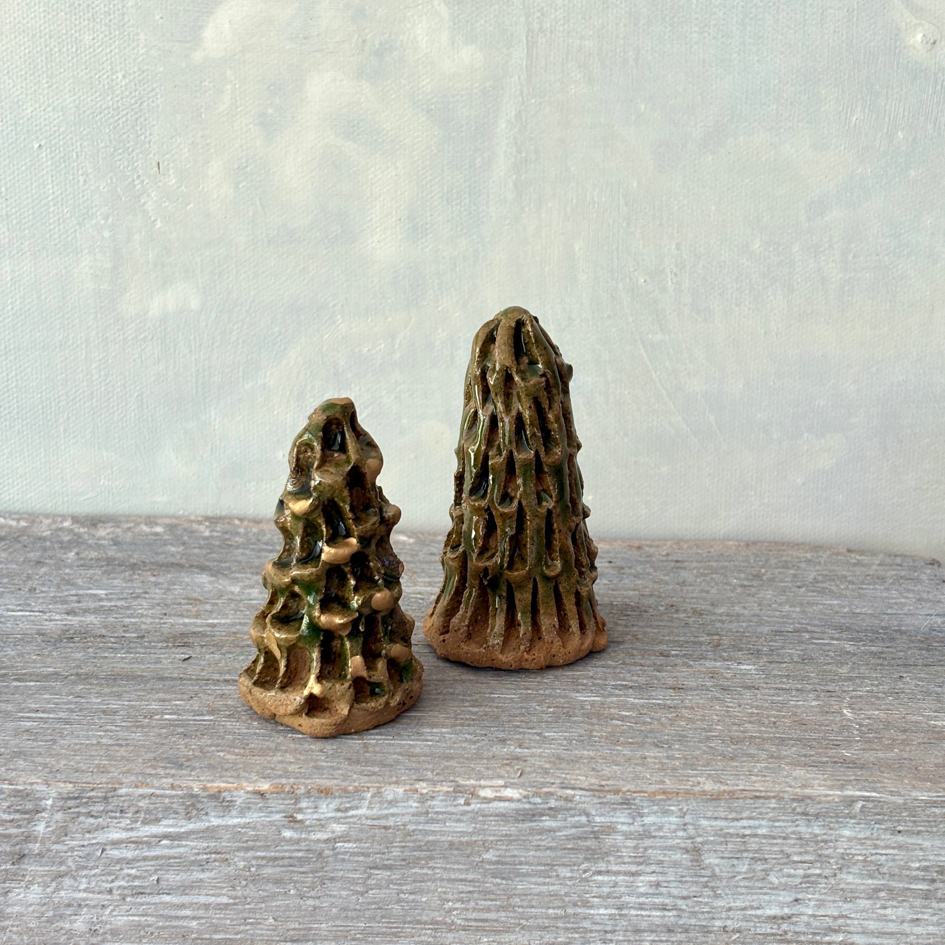 Two small ceramic Christmas Trees in Green