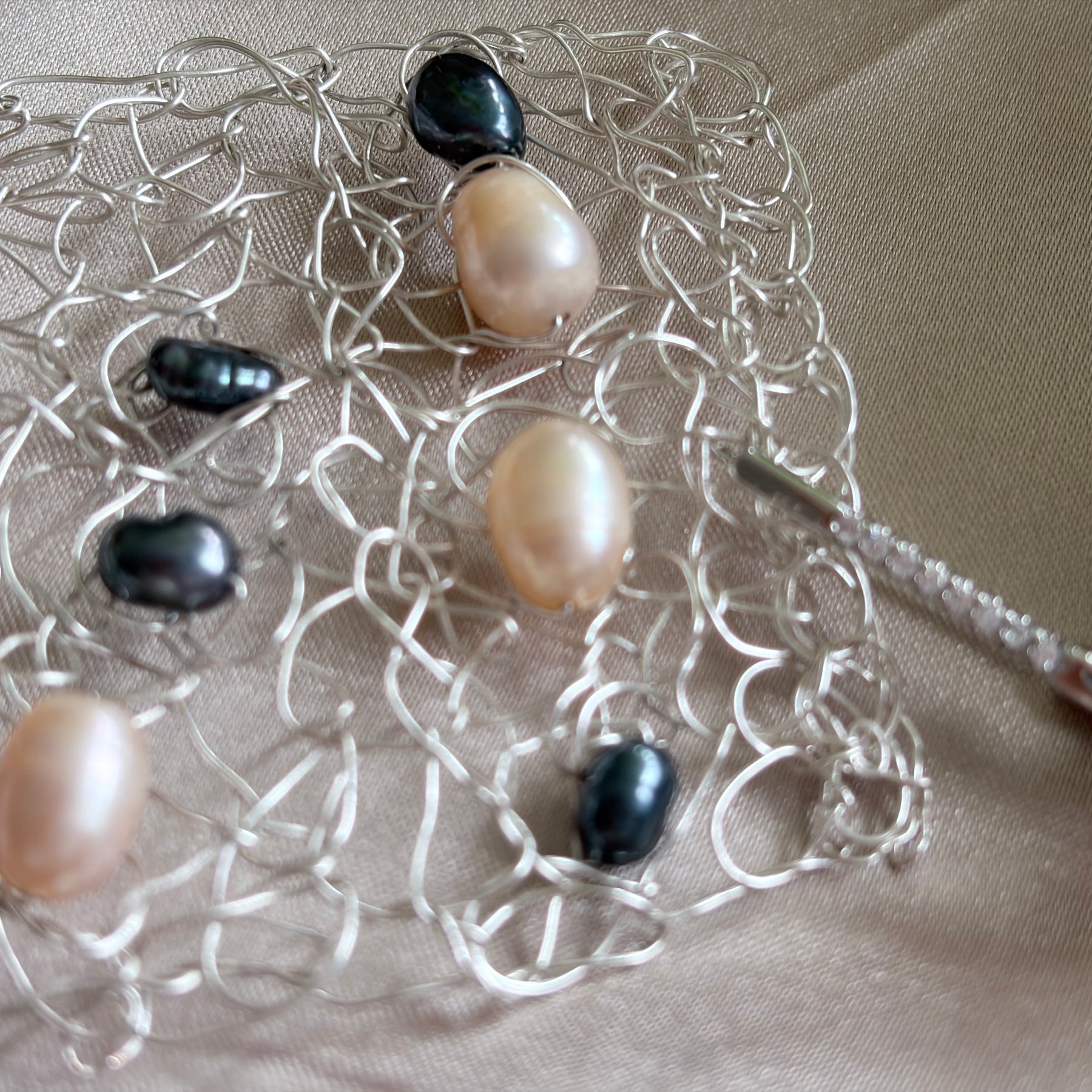 “Pearls Dance” — Peach and dark blue pearls cuff
