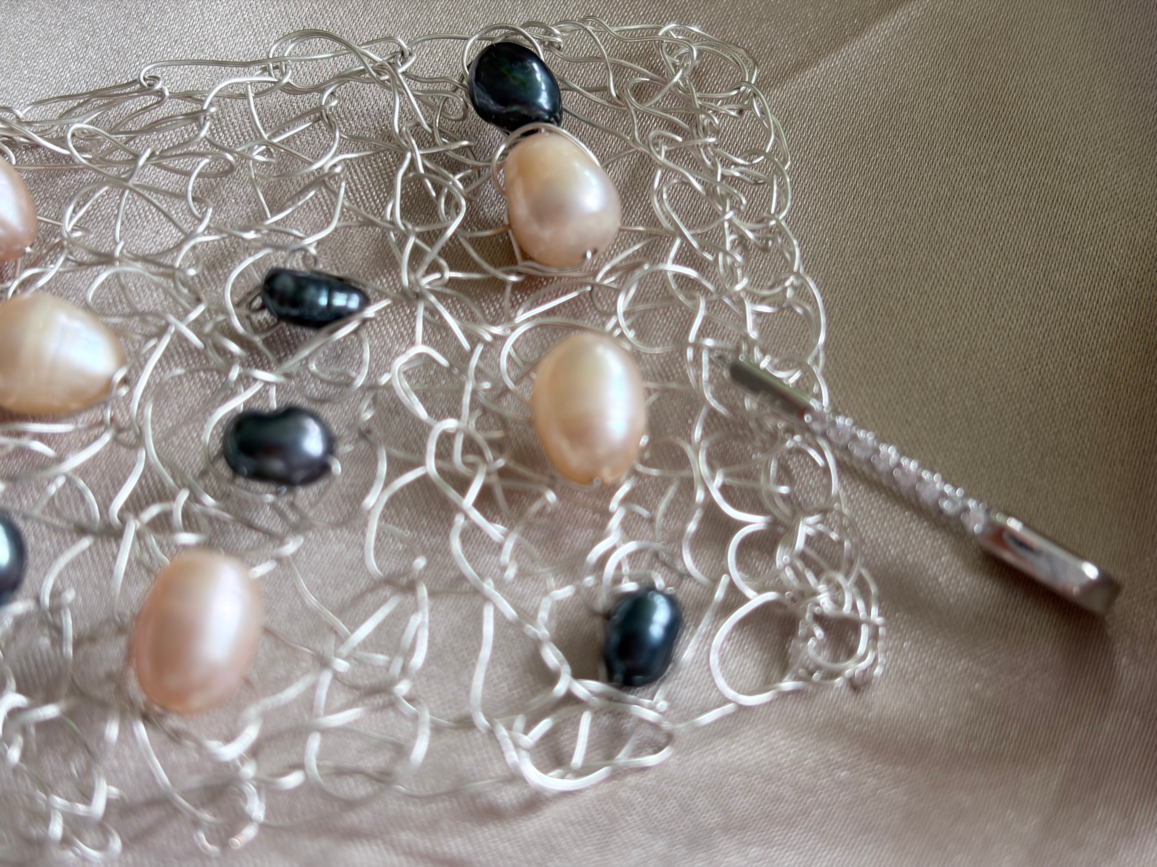 “Pearls Dance” — Peach and dark blue pearls cuff