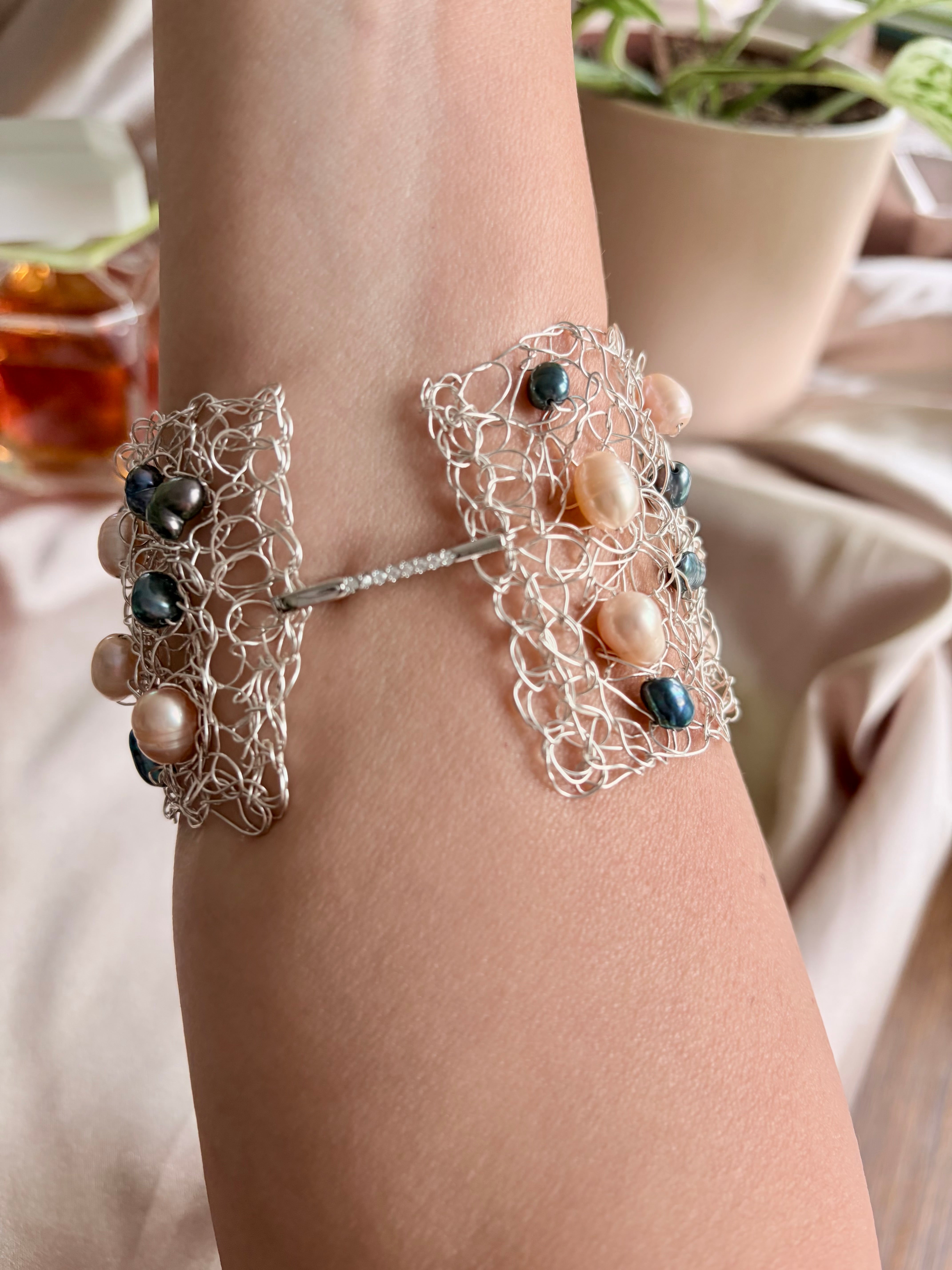 “Pearls Dance” — Peach and dark blue pearls cuff