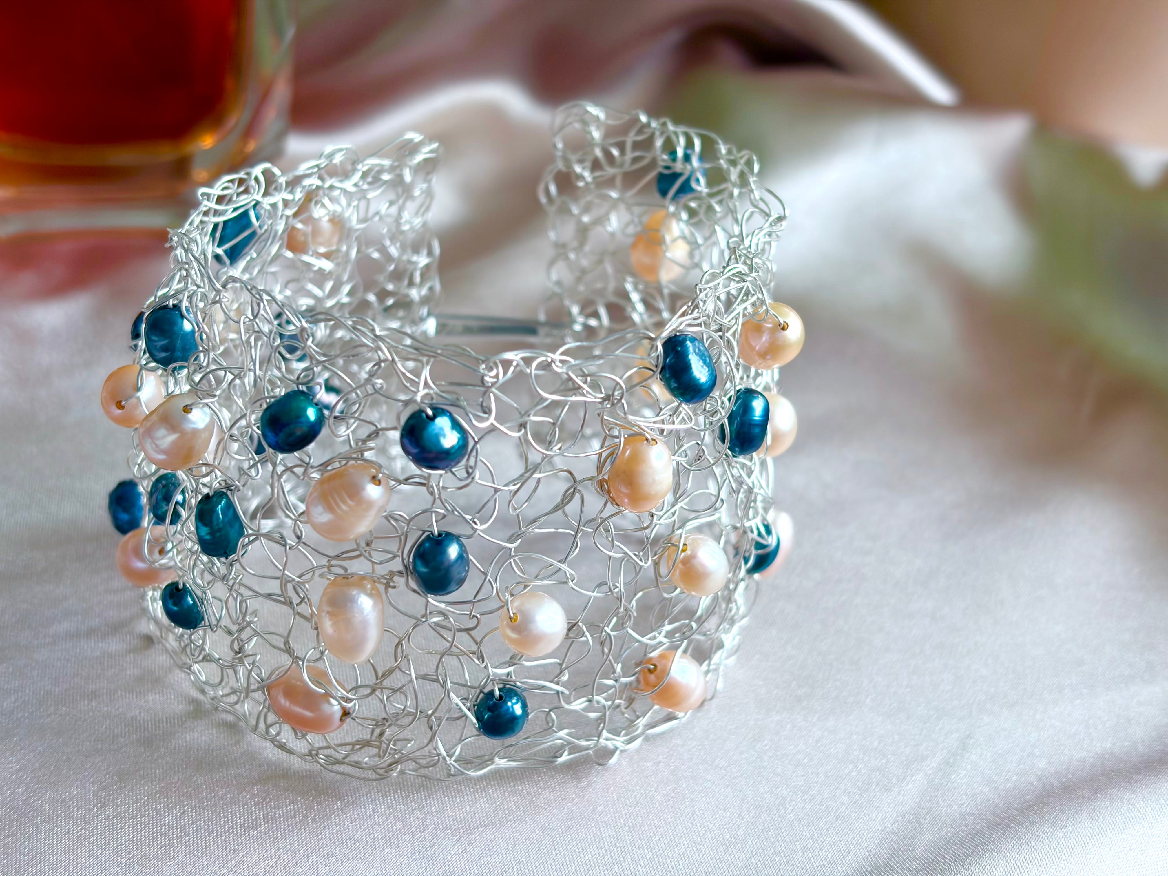 “Pearls Dance” — Peach and dark blue pearls cuff