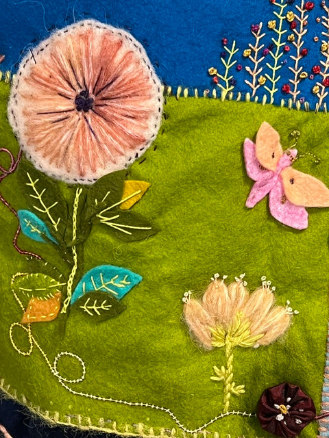Handmade and hand embroidered cushion