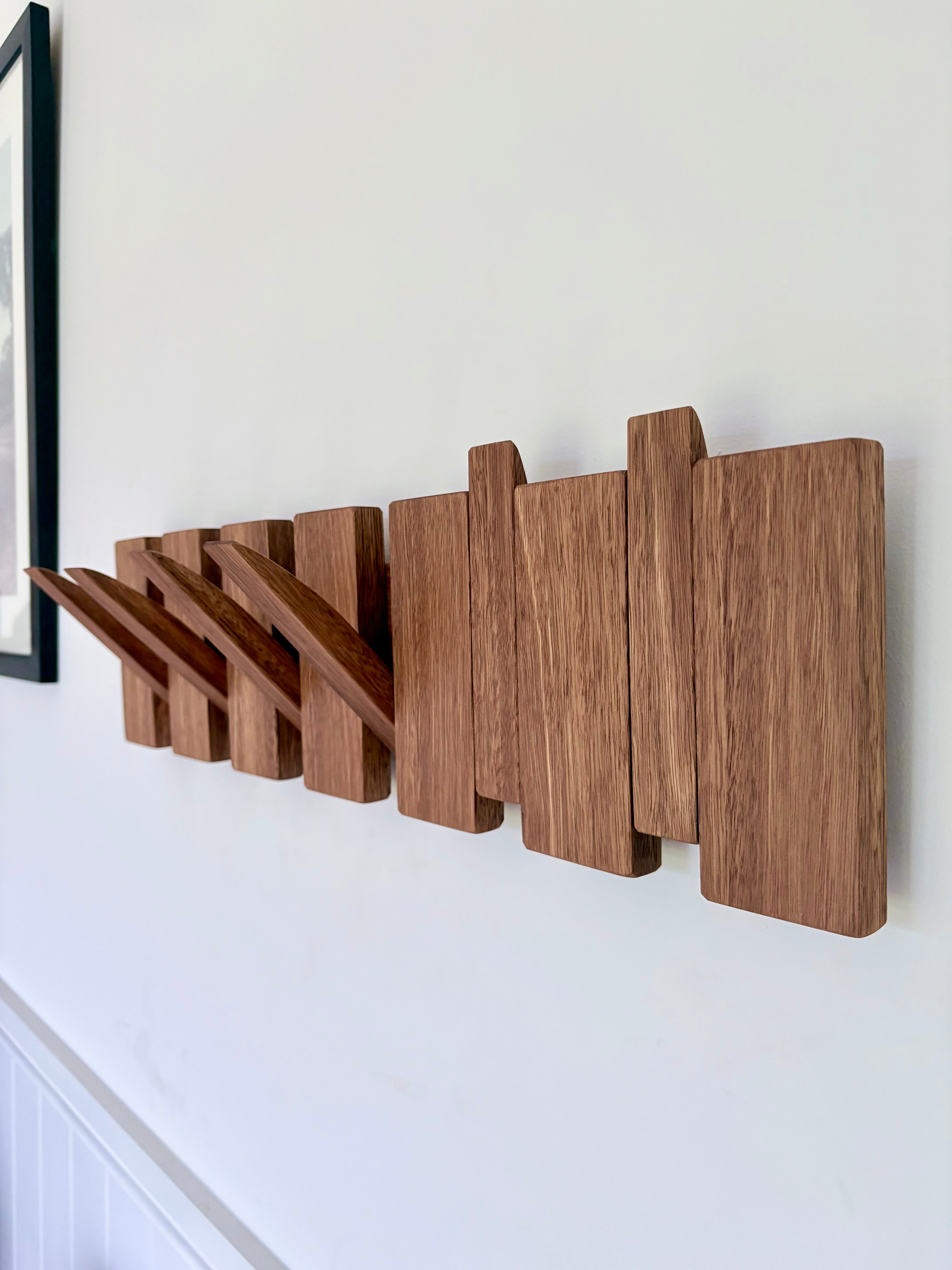 Grey box piano style coat rack