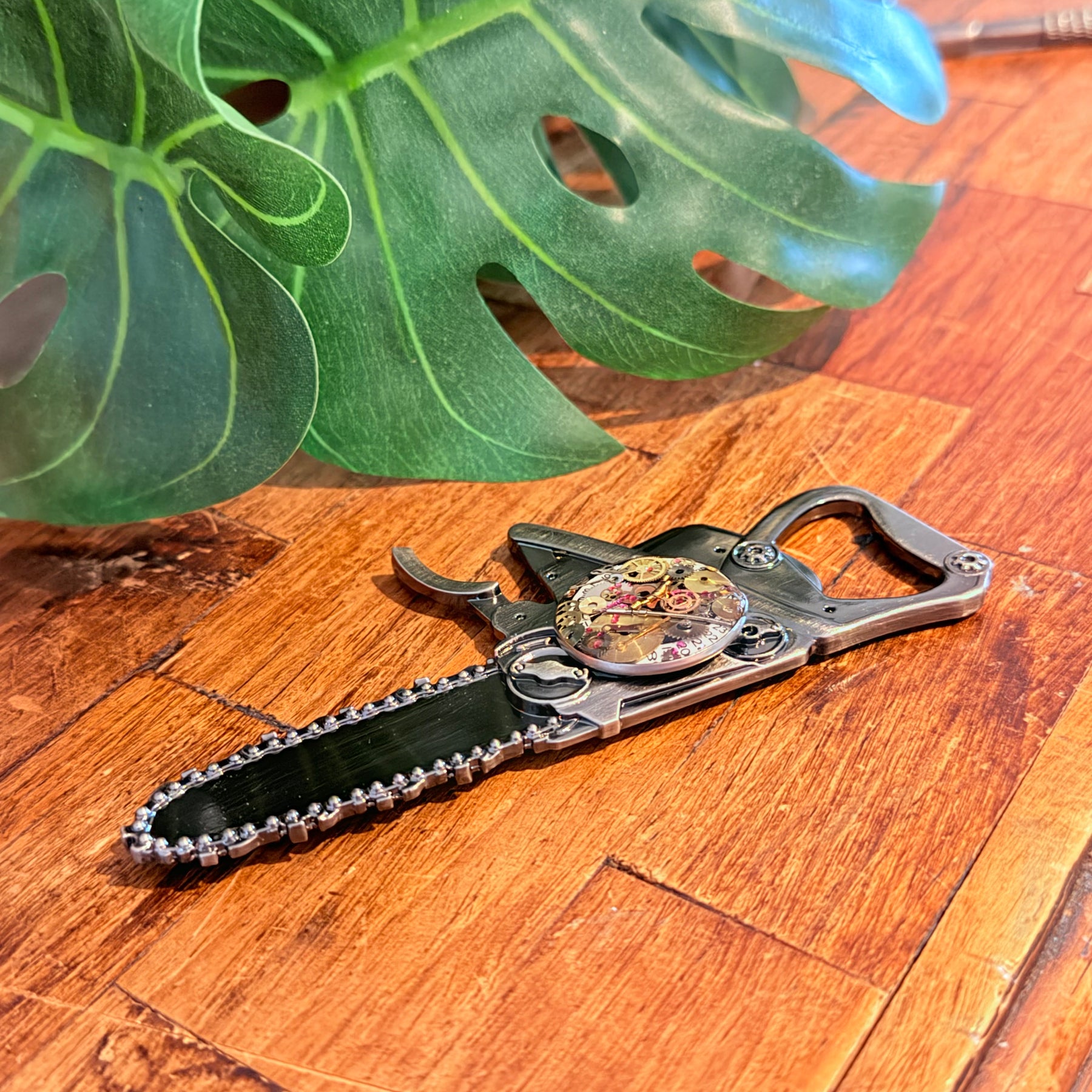 Steampunk watch parts  bottle opener (Chain Saw)