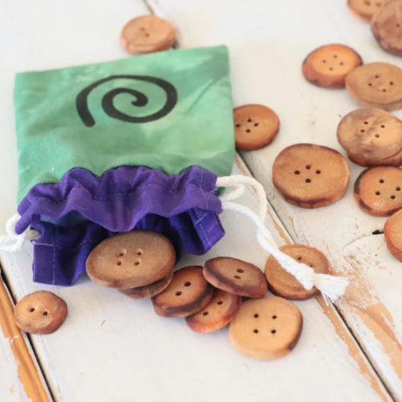 Hand carved Avocado pit Buttons, set of 10 with hand dyed pouch.