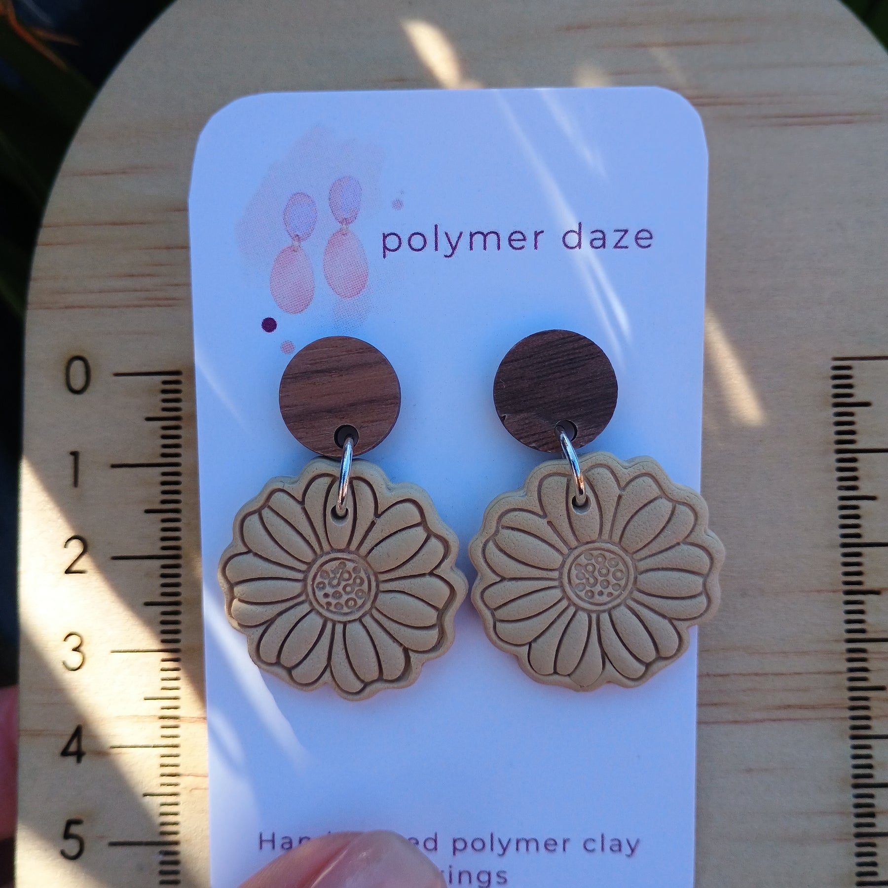 Embossed flower earrings with natural wood stud top beige