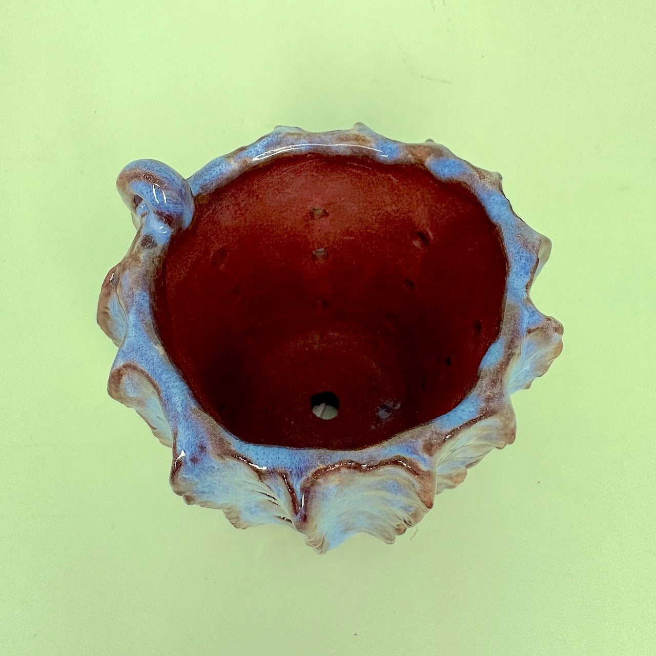 Ceramic orchid pot with vertical ridges