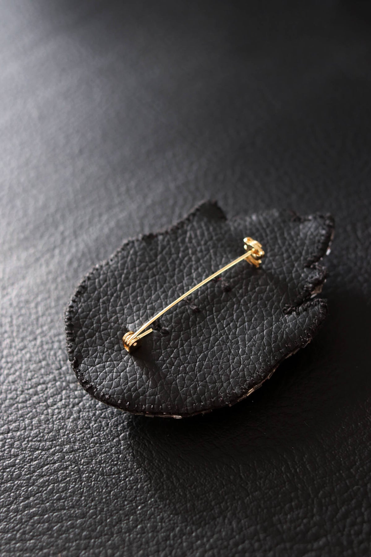 Beaded Fire Eye Brooch