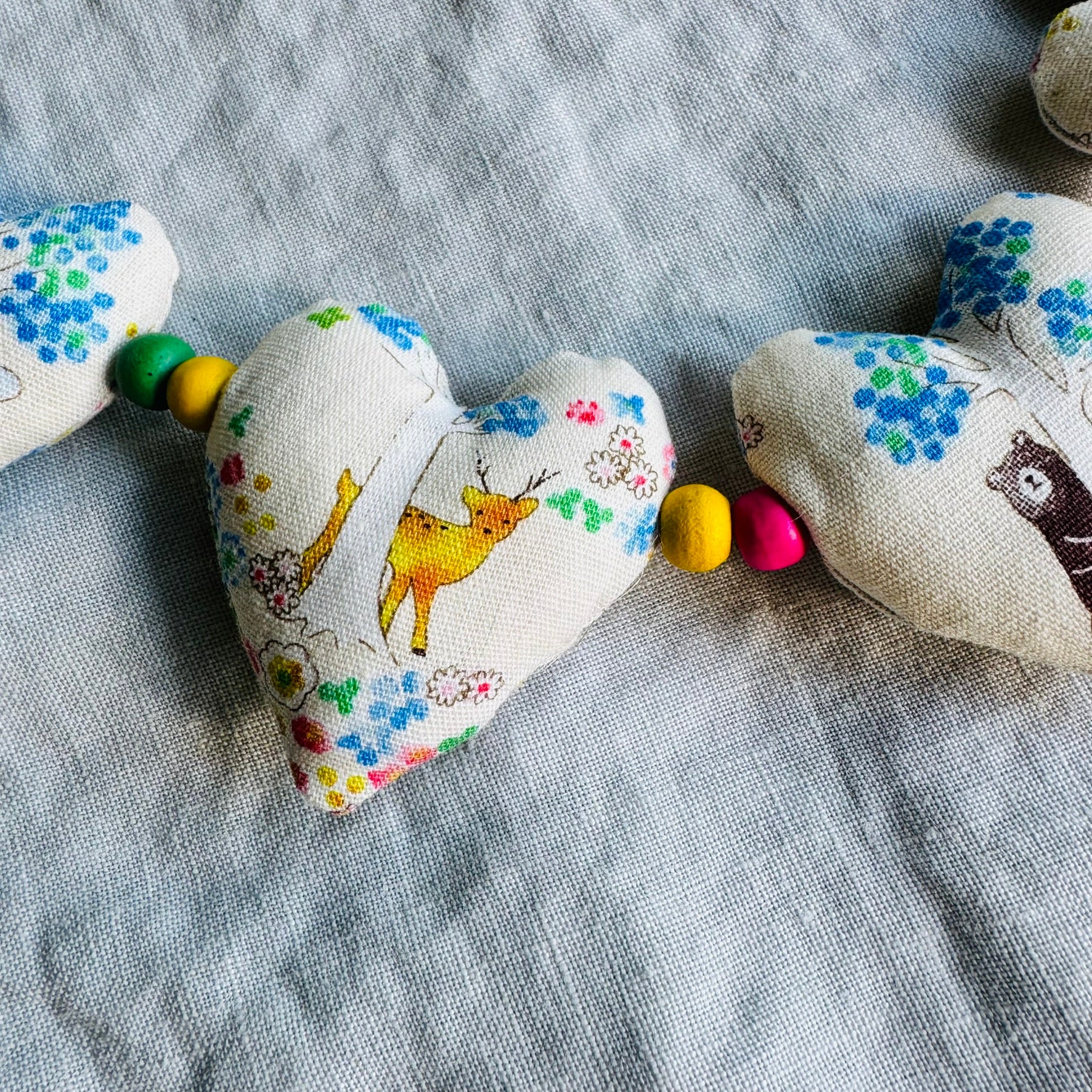 Handmade 'strings of love' heart garland - animals